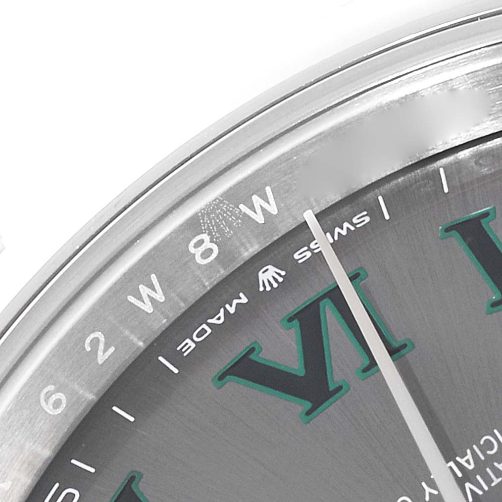 This close-up image of the Rolex Datejust 41 126300 Men
s Stainless Steel Grey Dial 126300 Men
s Stainless Steel Grey Dial shows the upper left portion of the dial and part of the minute hand.