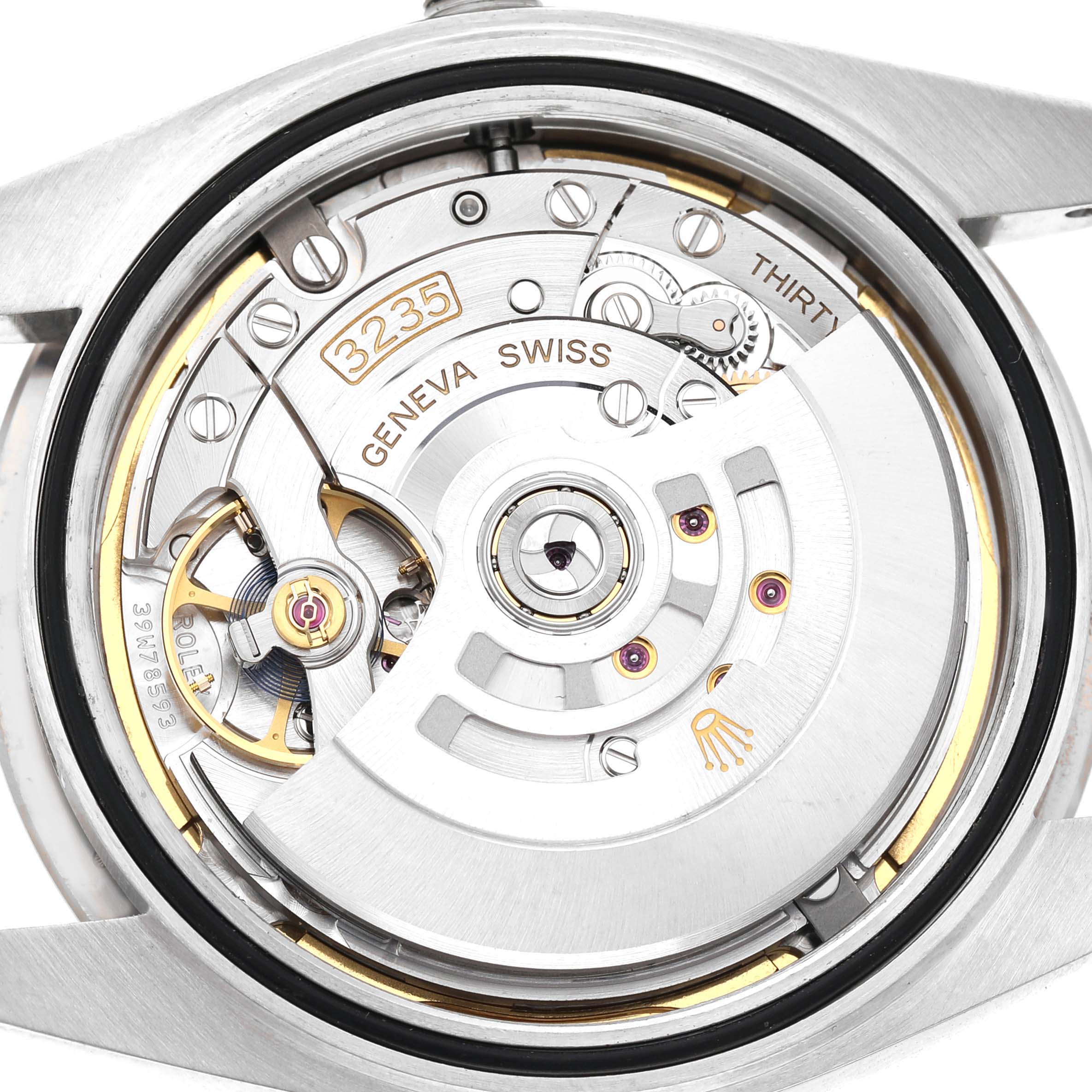 The image shows the movement and rotor of a Rolex Datejust 41 126334 Men's Stainless Steel Blue Dial watch from a rear angle.