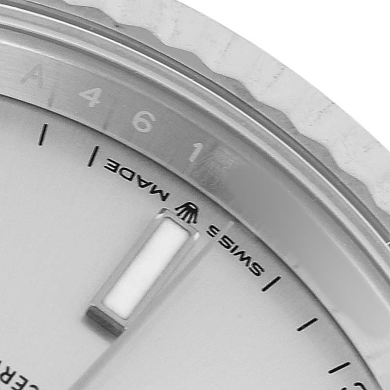 The image shows a partial close-up of the Rolex Datejust 41 126334 Men's Stainless Steel Silver Dial dial, including the bezel, chapter ring, and hour markers.