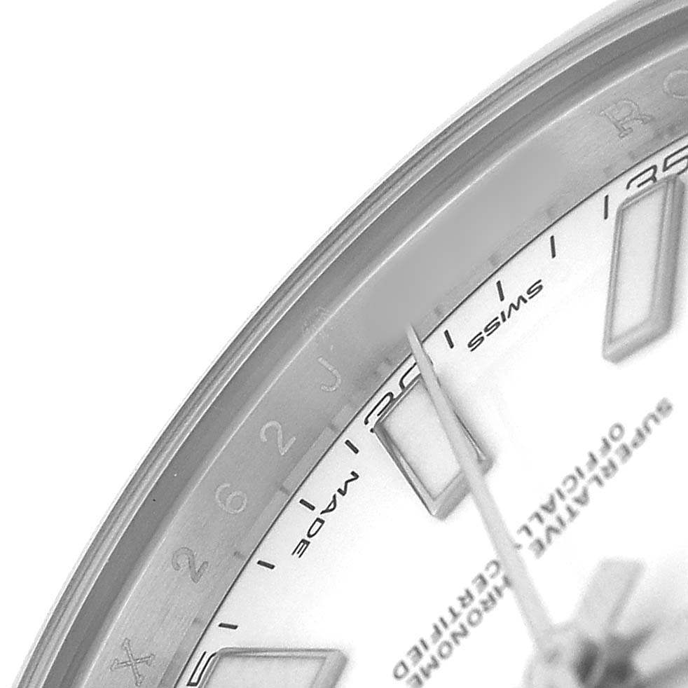 The image shows a close-up of the dial and bezel of the Rolex Datejust 41 116300 Men's Stainless Steel White Dial, highlighting the hour markers and inscriptions.