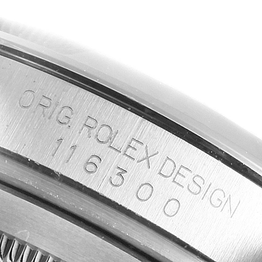 The image shows a close-up of the Rolex Datejust 41 116300 Men's Stainless Steel White Dial model's case side, highlighting the engraved design and model number.