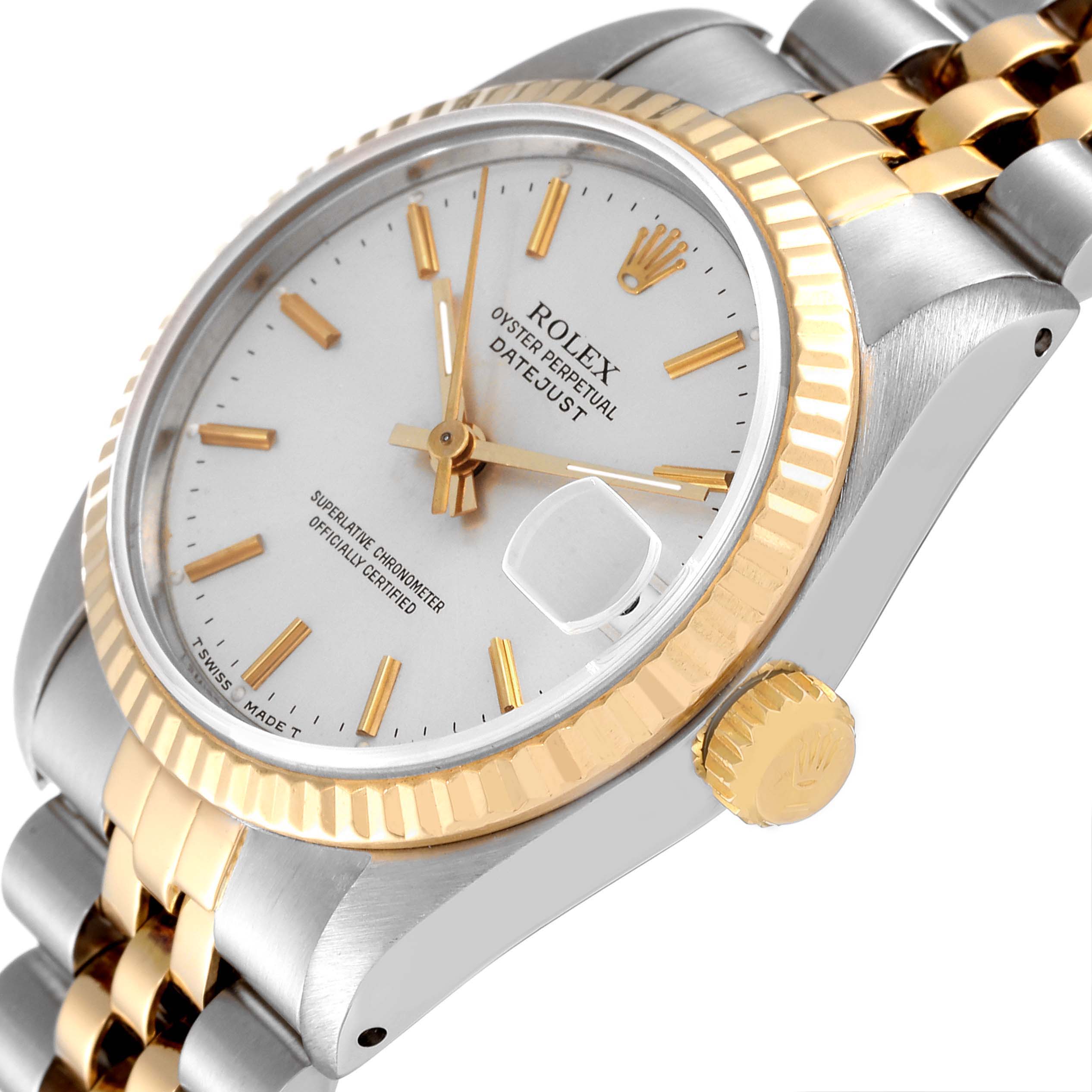 This image shows a mid-size Rolex Oyster Perpetual Datejust watch at an angled side view, highlighting the dial, crown, and bi-metal bracelet.