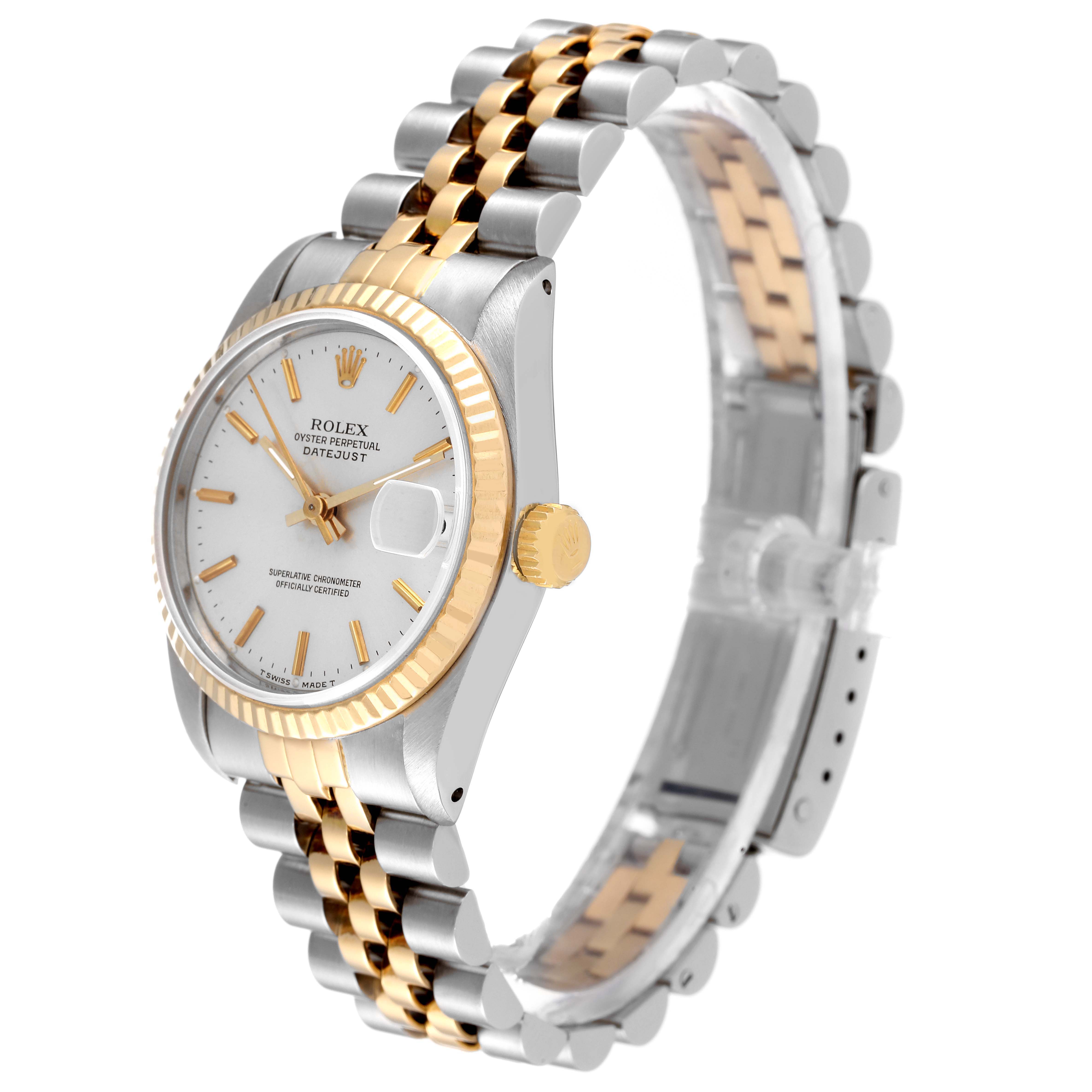 The image shows a side and front view of a Rolex Mid-Size 68273 Women's Steel and Gold (two tone) Silver Dial 68273 Women's Steel and Gold (two tone) Silver Dial Datejust with a two-tone bracelet and white dial.