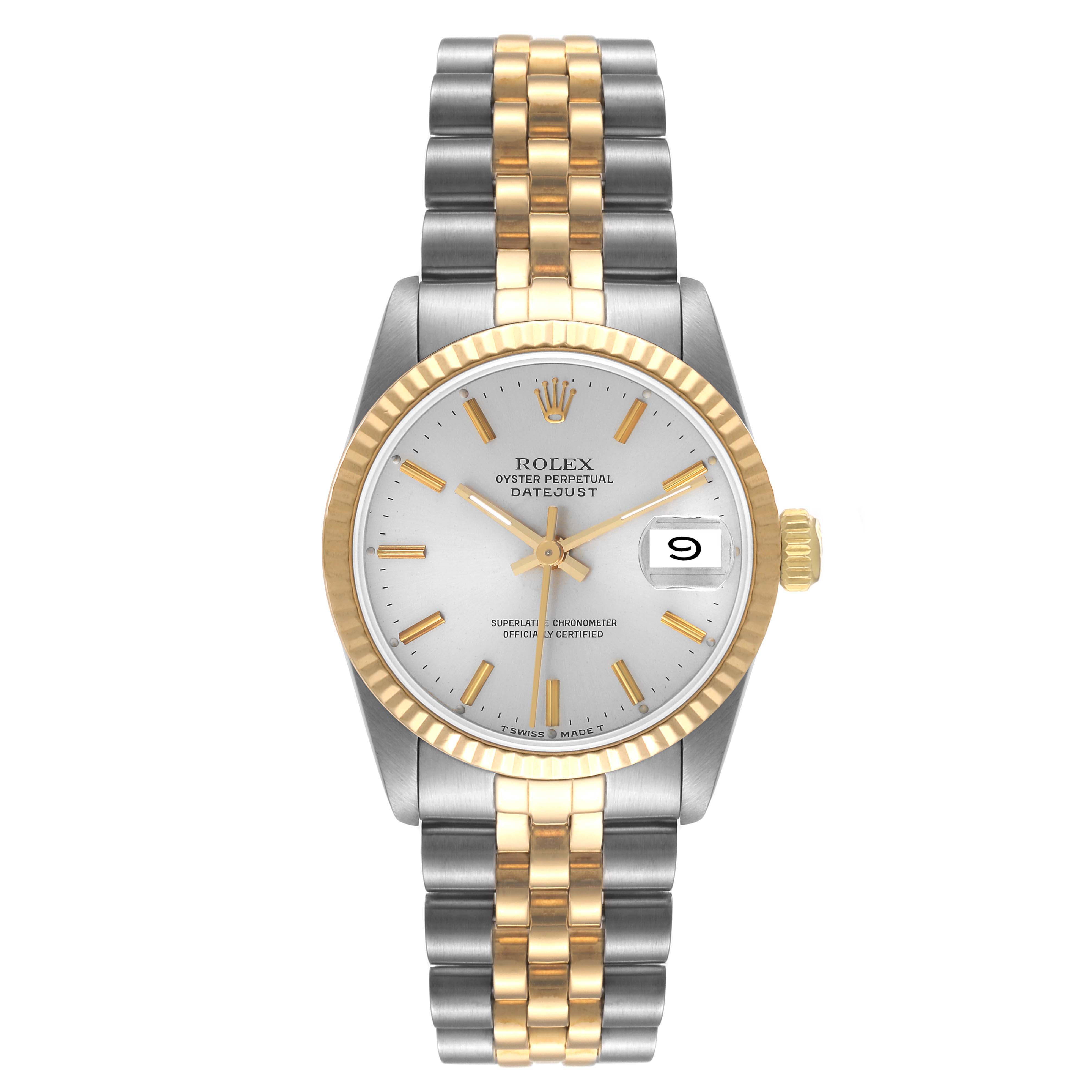 The Rolex Mid-Size 68273 Women's Steel and Gold (two tone) Silver Dial 68273 Women's Steel and Gold (two tone) Silver Dial Oyster Perpetual Datejust watch is shown from a top-down angle, displaying its face, bezel, and bracelet.