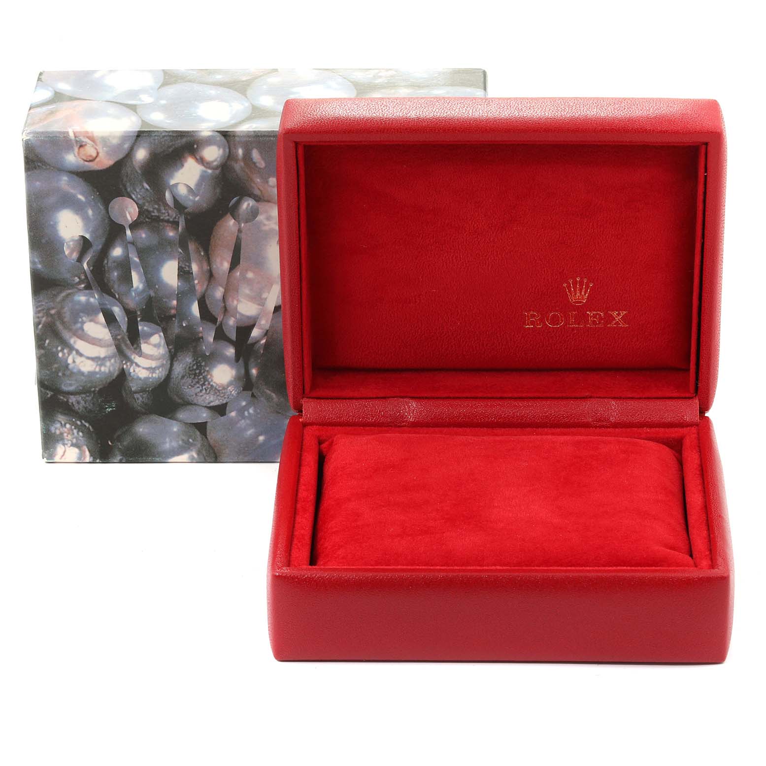 The image shows an open red Rolex watch box, likely for the Datejust model, with a decorative outer box in the background.