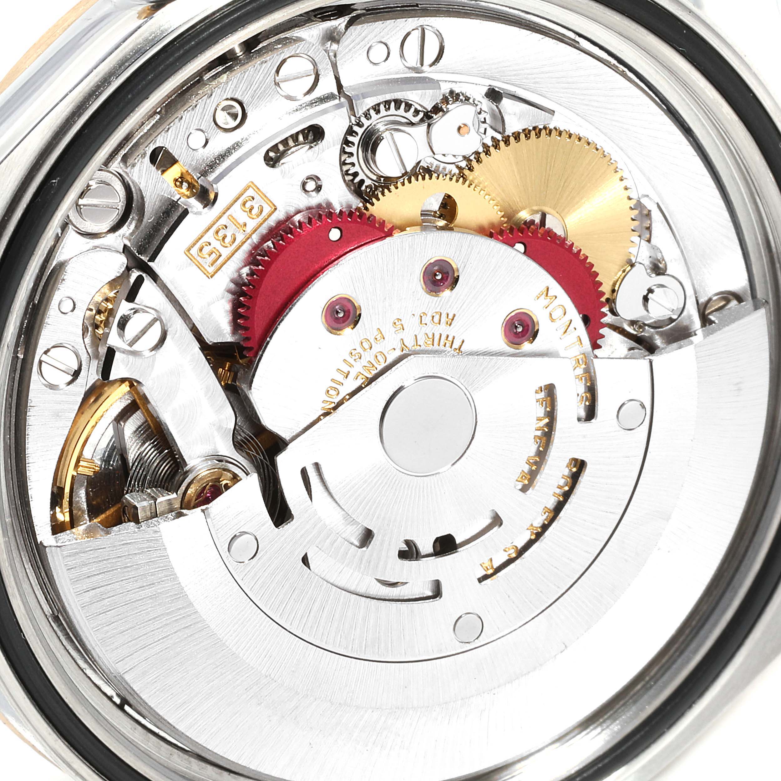 This image shows the intricate internal mechanism of the Rolex Datejust 16233 Men
s Steel and Gold (two tone) Champagne Dial 16233 Men
s Steel and Gold (two tone) Champagne Dial watch from a close-up angle.