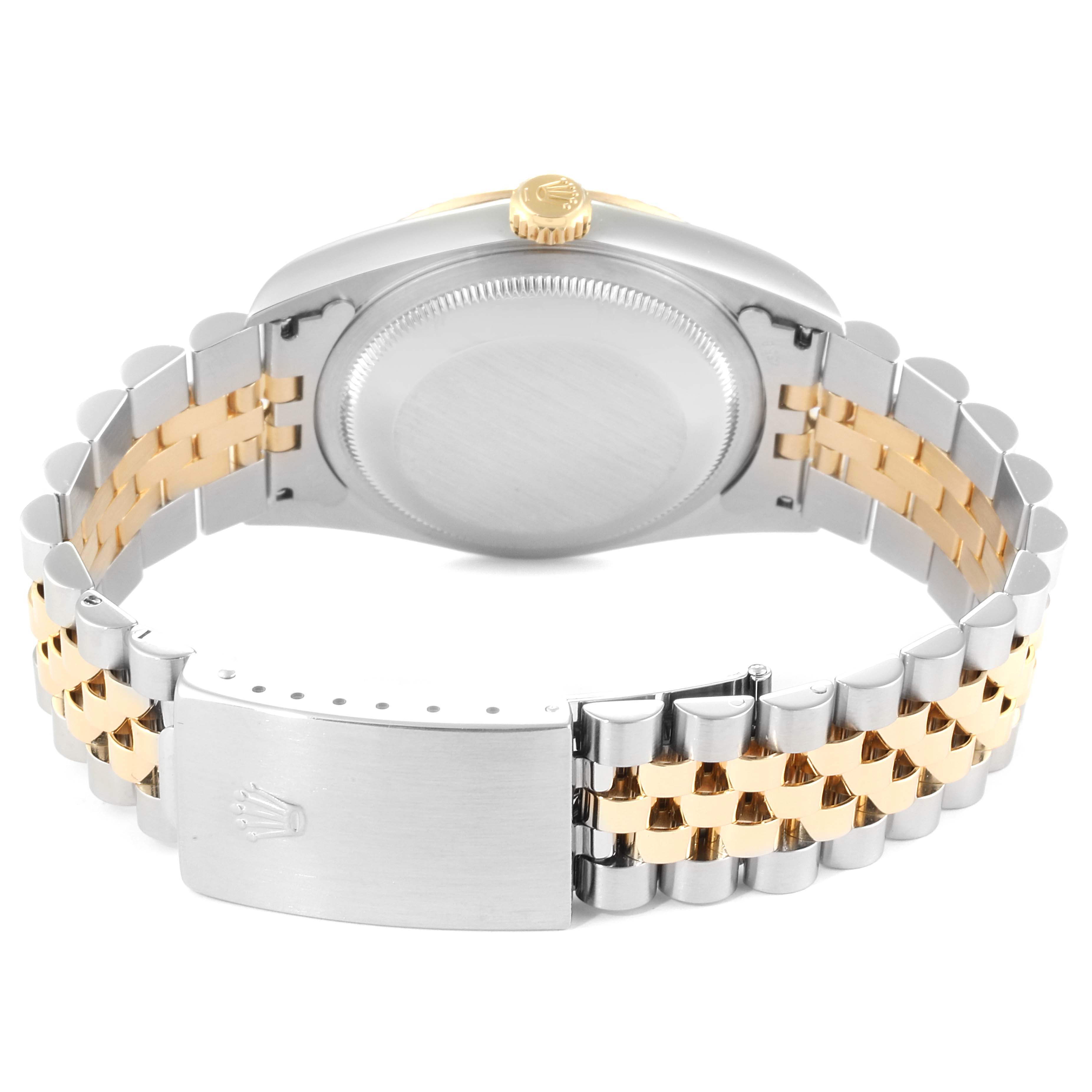 The image shows the Rolex Datejust 16233 Men
s Steel and Gold (two tone) Champagne Dial 16233 Men
s Steel and Gold (two tone) Champagne Dial watch from the rear, highlighting the case back, crown, and Jubilee bracelet with clasp.