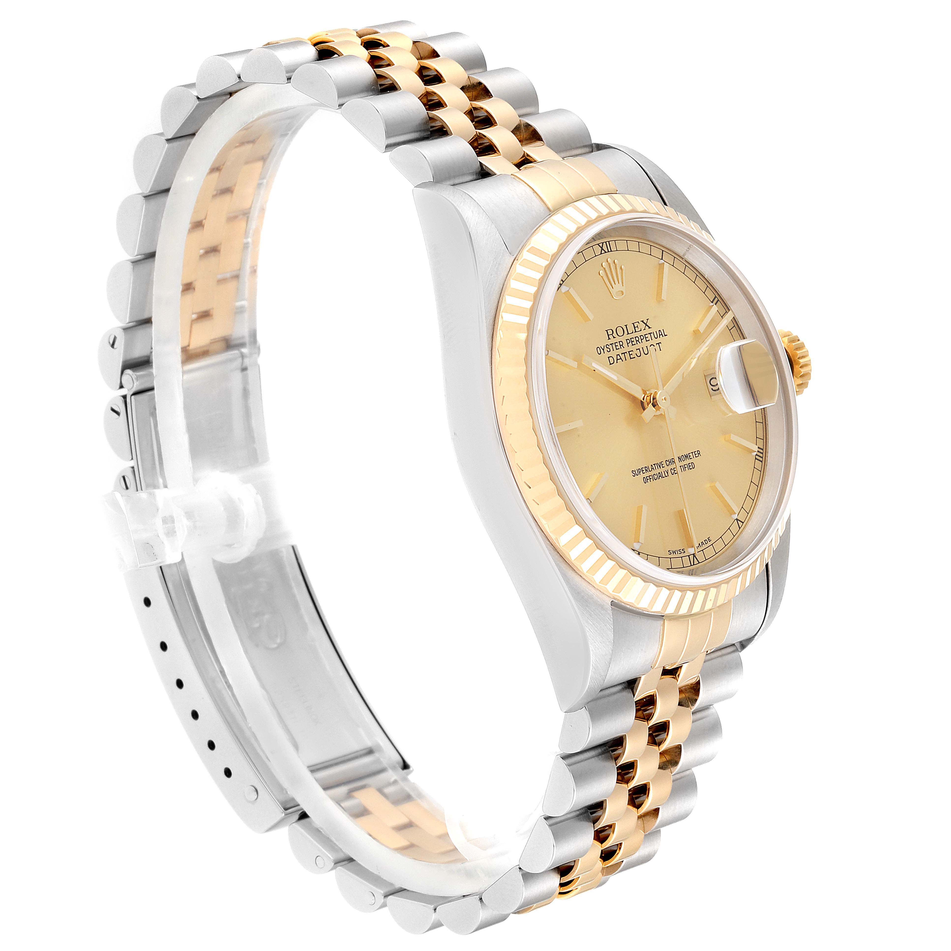 The image shows a side angle of a Rolex Datejust 16233 Men
s Steel and Gold (two tone) Champagne Dial 16233 Men
s Steel and Gold (two tone) Champagne Dial watch, highlighting its two-tone bracelet, case, and gold dial.