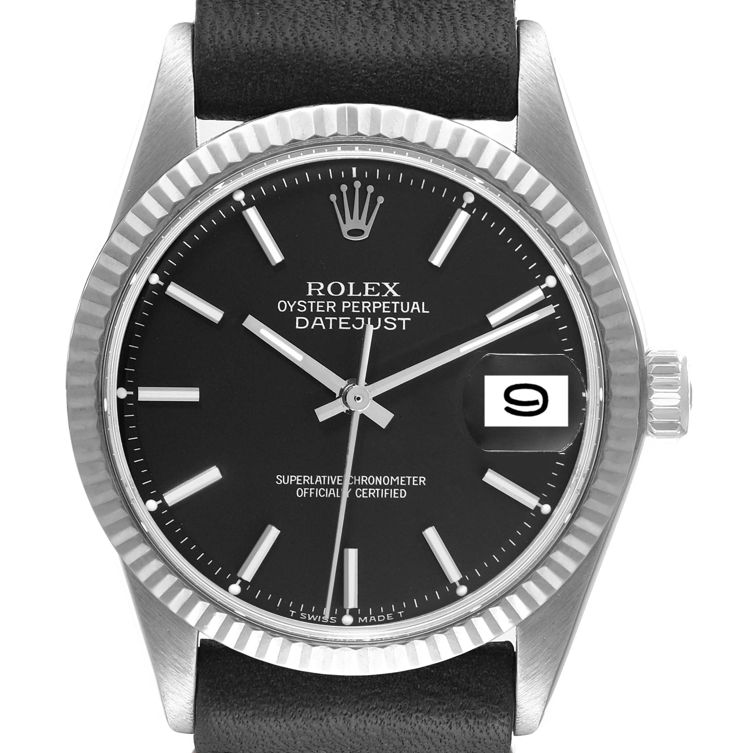 The image shows the front view of a Rolex Datejust 1601 Men
s Stainless Steel Black Dial 1601 Men
s Stainless Steel Black Dial watch, highlighting its black dial, silver hands, fluted bezel, and date window.