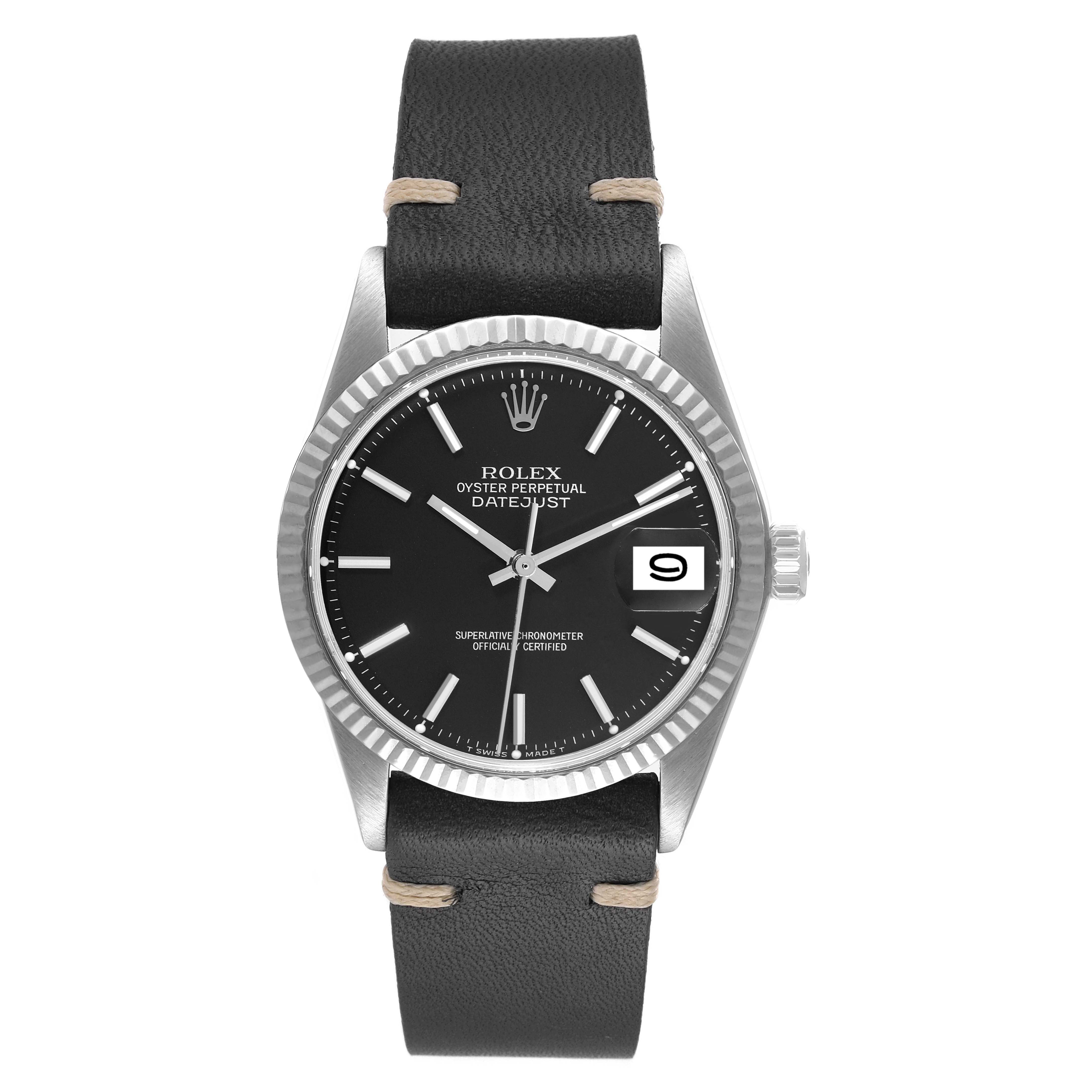 This Rolex Datejust 1601 Men
s Stainless Steel Black Dial 1601 Men
s Stainless Steel Black Dial watch is shown from a front angle, displaying its black dial, date window, and black leather strap.