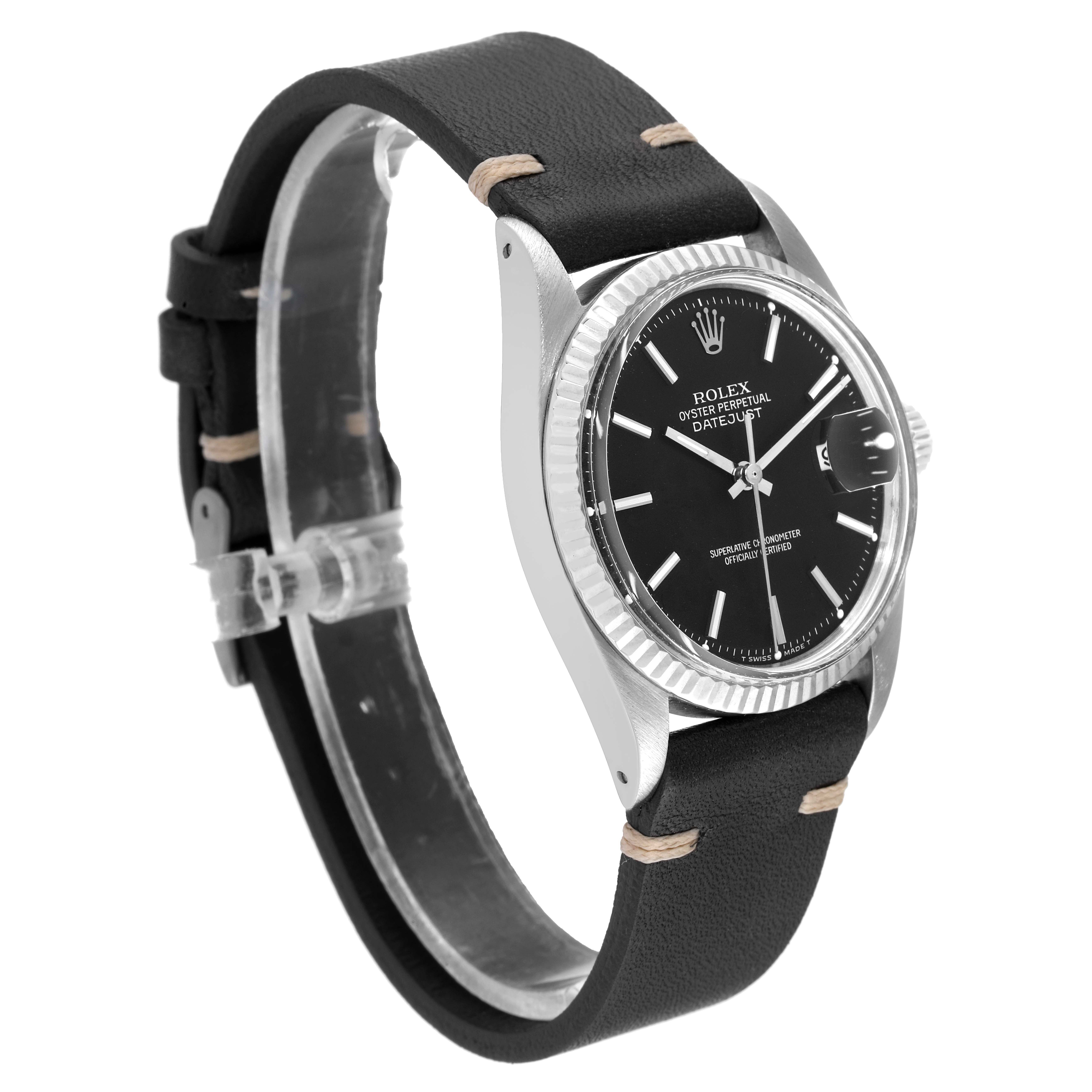 The Rolex Datejust 1601 Men
s Stainless Steel Black Dial 1601 Men
s Stainless Steel Black Dial watch is shown from a front-side angle, highlighting its black dial, fluted bezel, and leather strap.