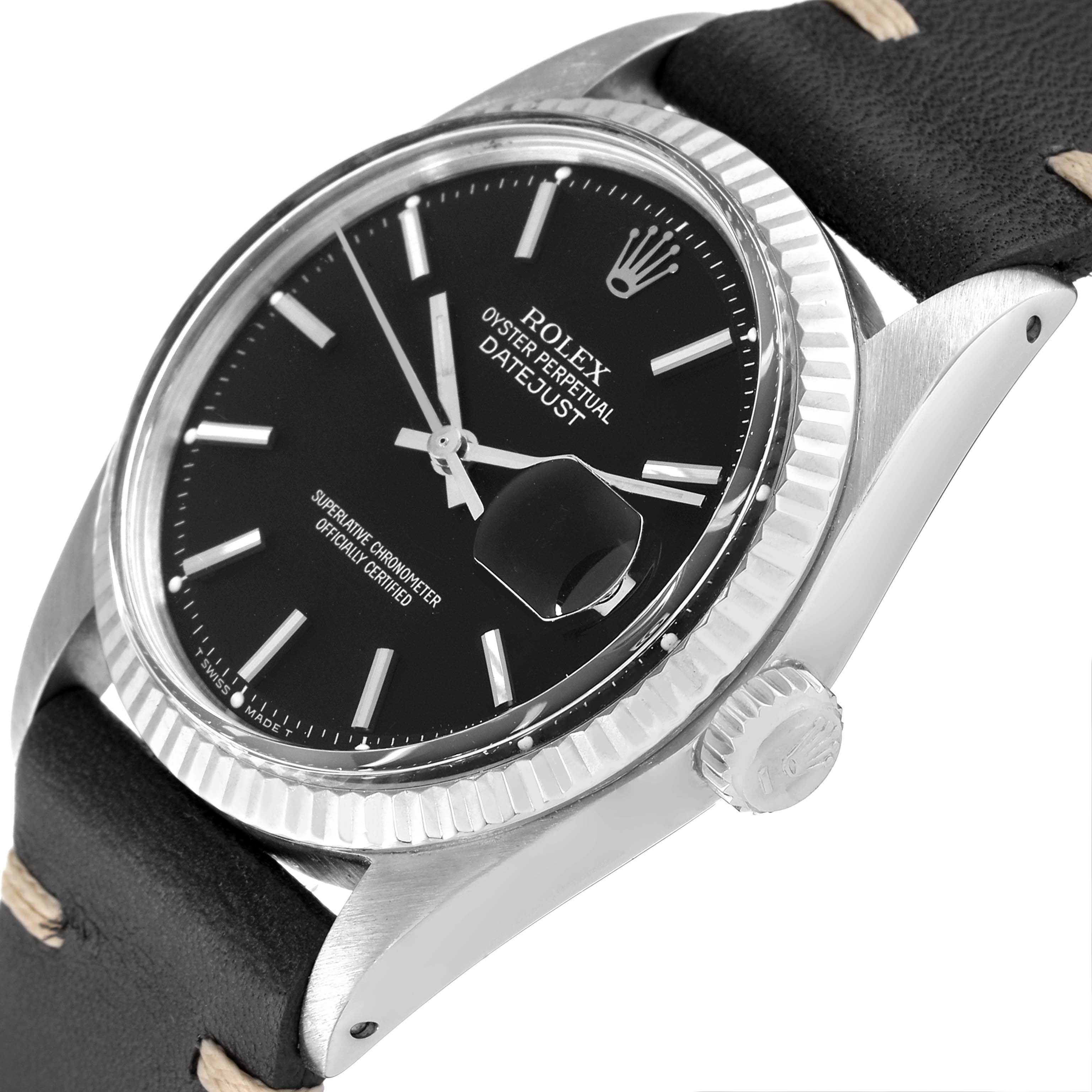 This image shows a Rolex Datejust 1601 Men
s Stainless Steel Black Dial 1601 Men
s Stainless Steel Black Dial watch featuring its black dial, fluted bezel, cyclops date window, crown, and leather strap.