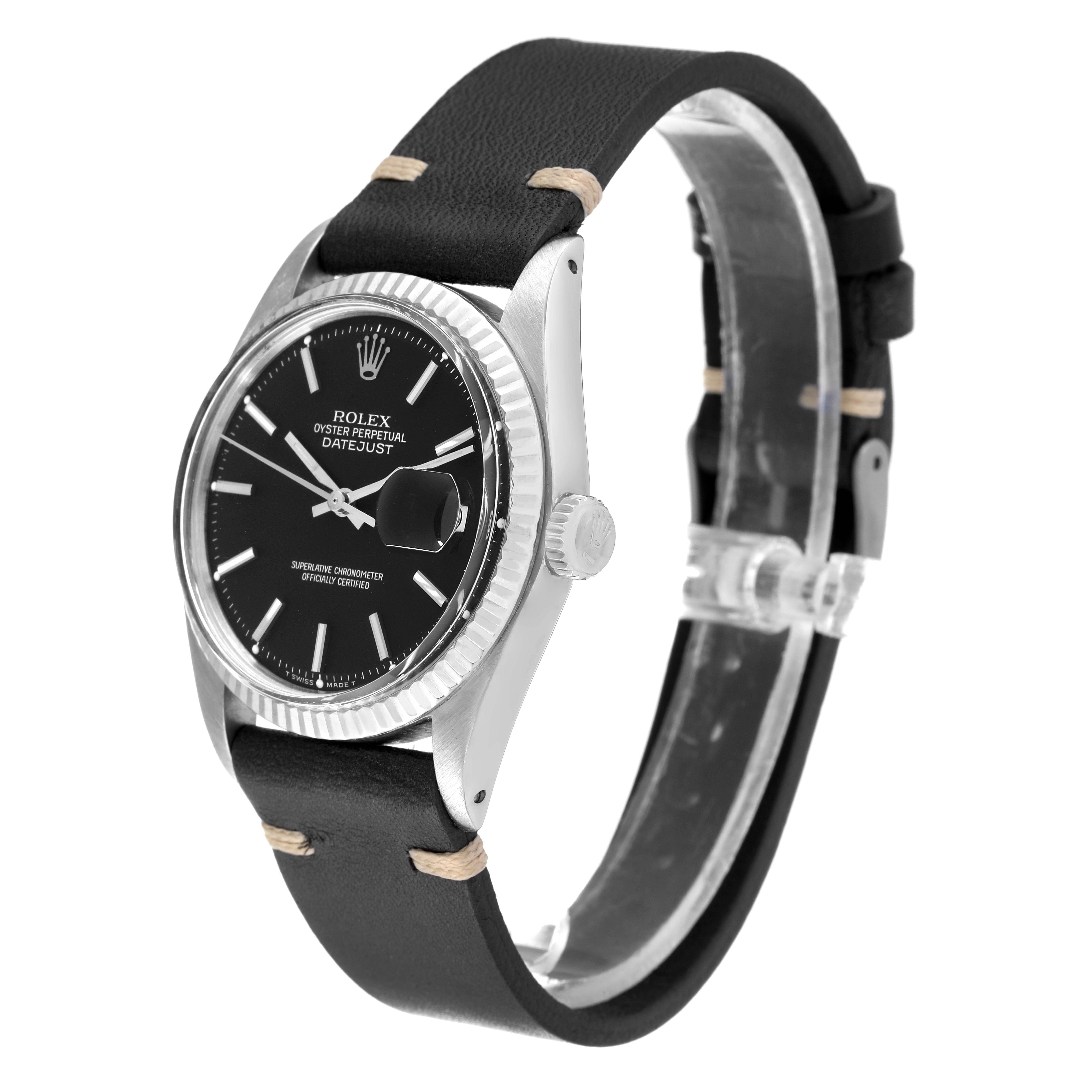 This image shows a Rolex Datejust 1601 Men
s Stainless Steel Black Dial 1601 Men
s Stainless Steel Black Dial watch at a front-side angle, highlighting its black dial, fluted bezel, and leather strap.