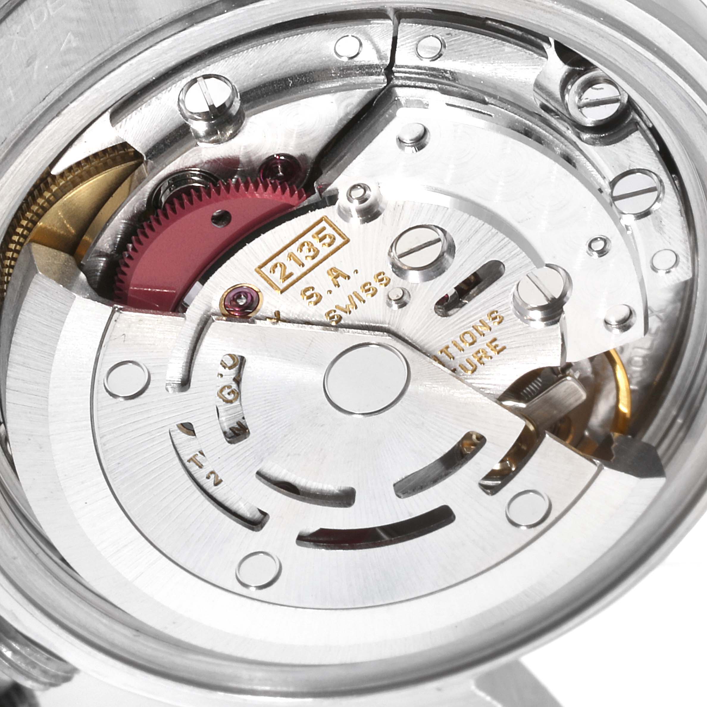 This image shows a close-up of the internal mechanism of a Rolex Datejust 69174 Women
s Stainless Steel Silver Dial 69174 Women
s Stainless Steel Silver Dial watch, focusing on the movement components.