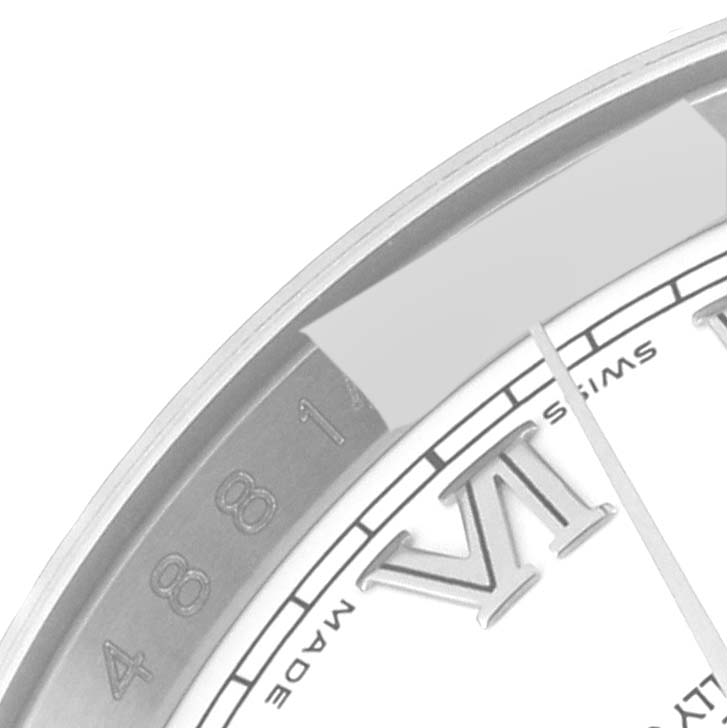 The image shows a close-up of the dial and bezel of a Rolex Datejust 116234 Men's Stainless Steel White Dial 116234 Men's Stainless Steel White Dial watch, highlighting the Roman numeral "VI" and part of the inner markings.