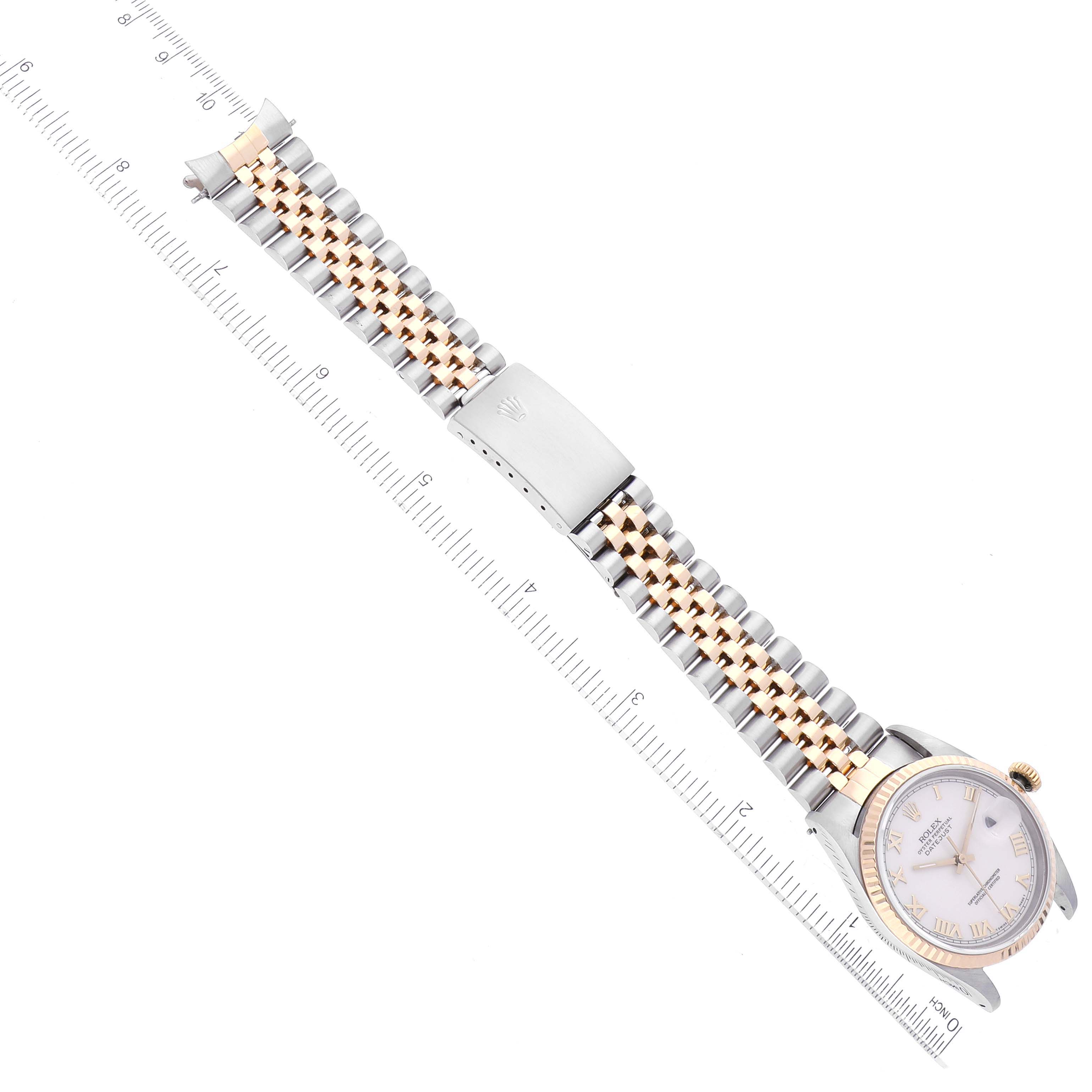 The Rolex Datejust 16233 Men's Steel and Gold (two tone) Beige Dial 16233 Men's Steel and Gold (two tone) Beige Dial watch is shown from a top-down angle, displaying the face, bracelet, and clasp.