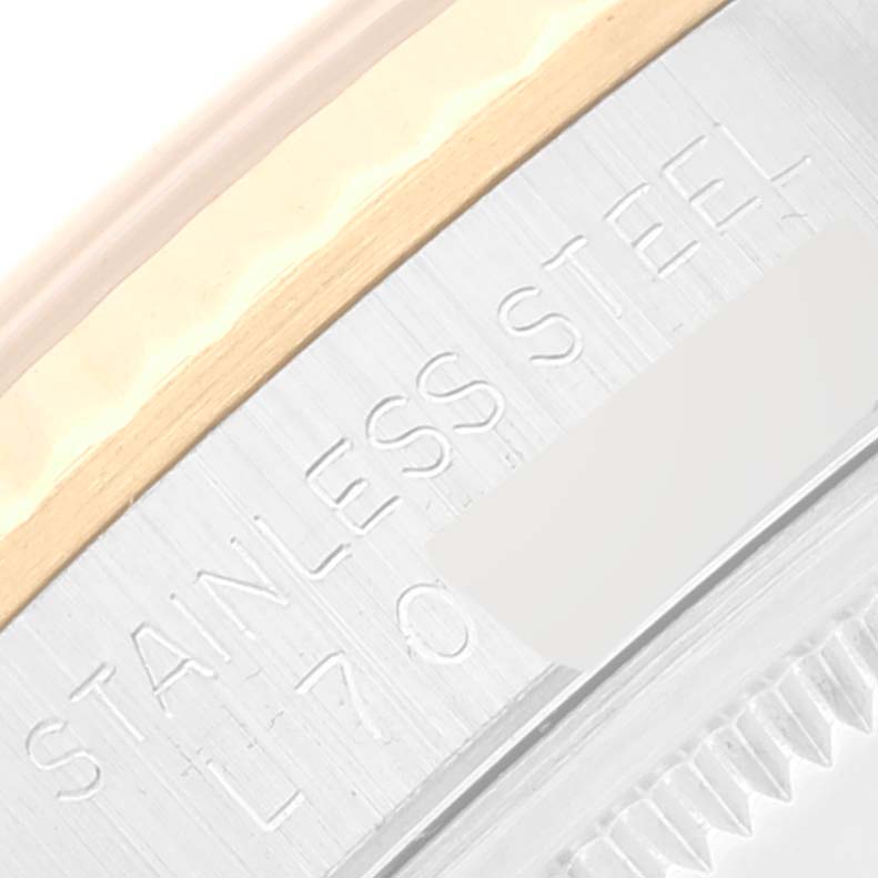 This close-up angle shows the side of the Rolex Datejust 16233 Men's Steel and Gold (two tone) Beige Dial 16233 Men's Steel and Gold (two tone) Beige Dial, highlighting the stainless steel and gold bezel.