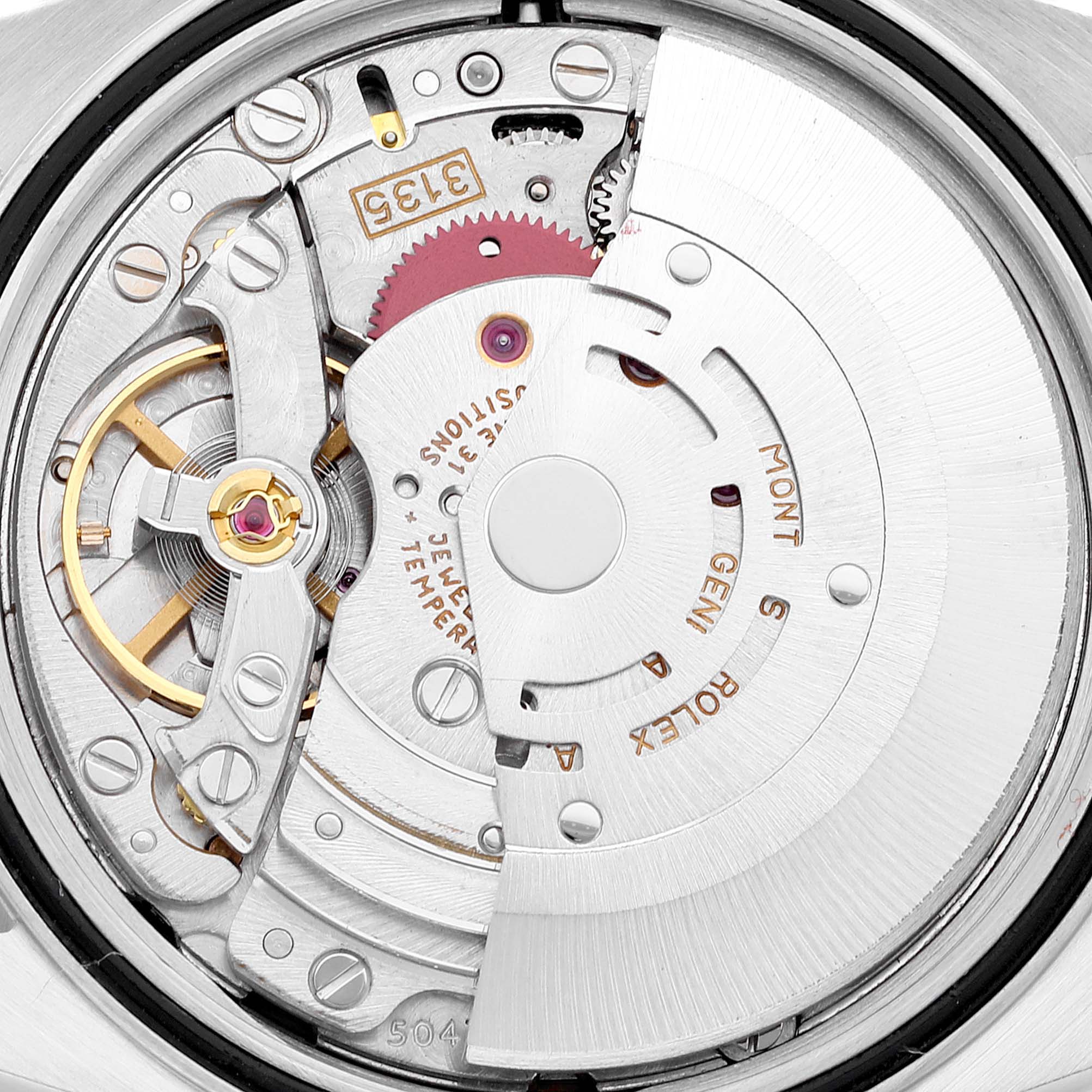 The image shows a close-up of the movement mechanism of a Rolex Datejust 16233 Men's Steel and Gold (two tone) Beige Dial 16233 Men's Steel and Gold (two tone) Beige Dial watch, highlighting its intricate inner workings.