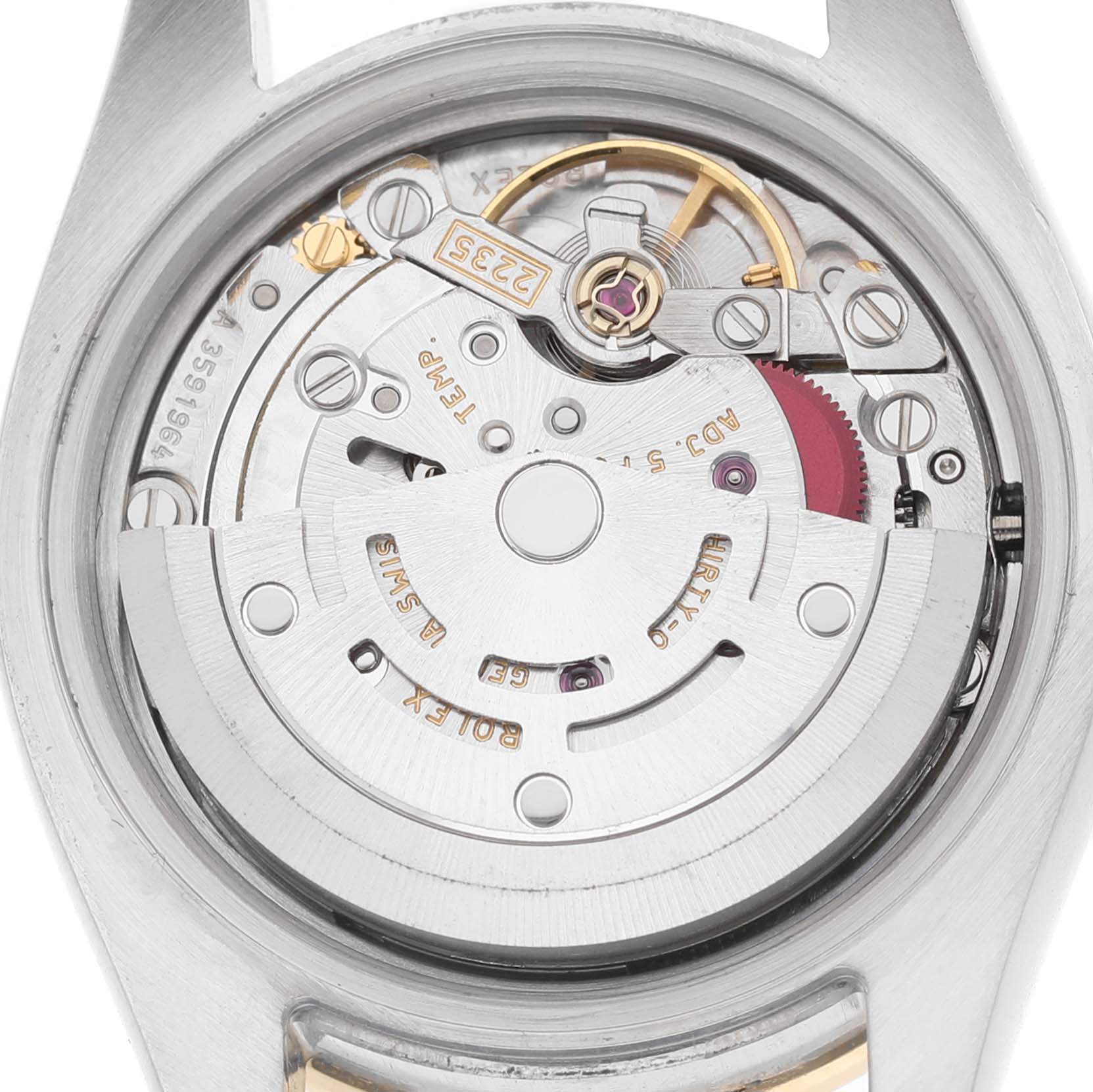 The image shows the movement of a Rolex Datejust 179383 Women's Steel and Gold (two tone) Silver Dial watch from a rear angle, highlighting its intricate components.
