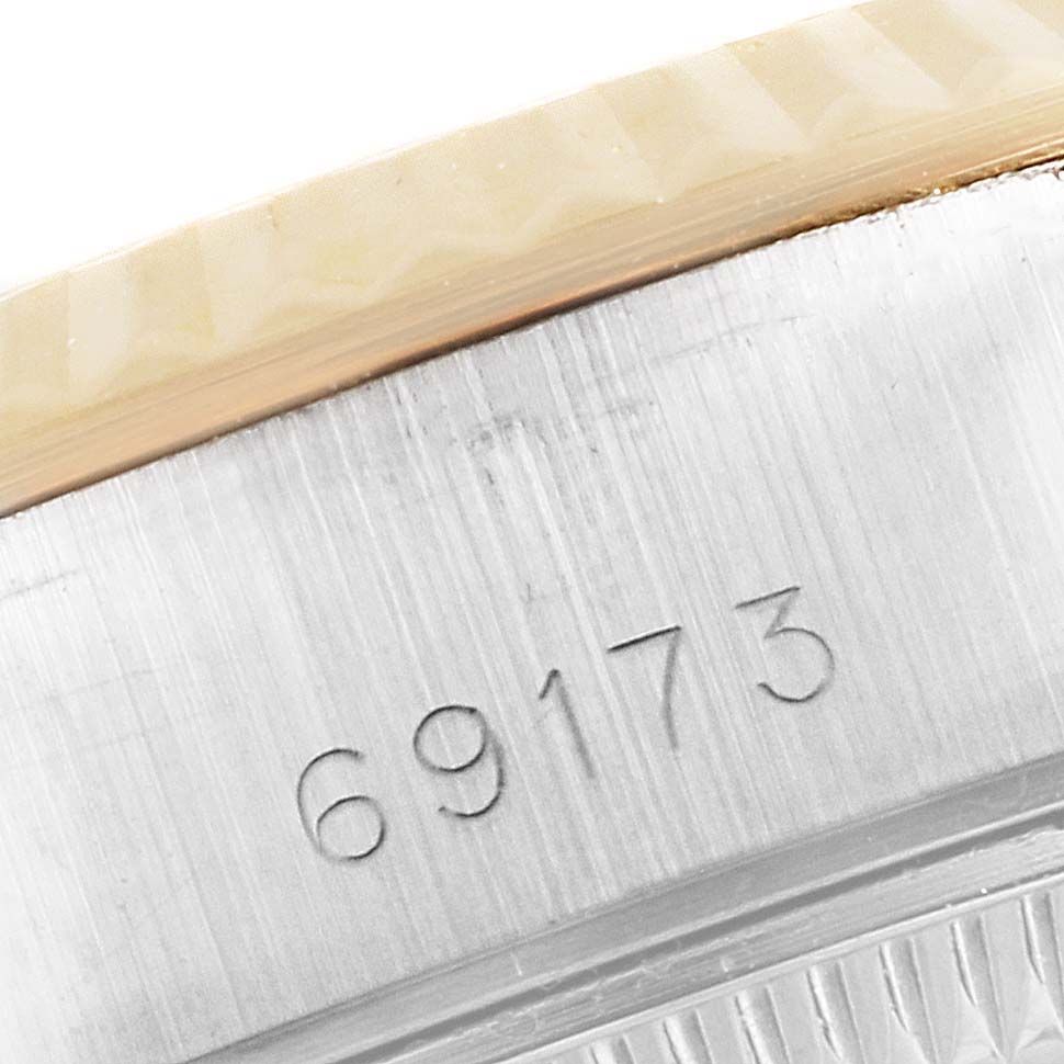 This image shows a close-up of the case number "69173" engraved on the side of a Rolex Datejust 69173 Women
s Steel and Gold (two tone) Champagne Dial 69173 Women
s Steel and Gold (two tone) Champagne Dial watch.