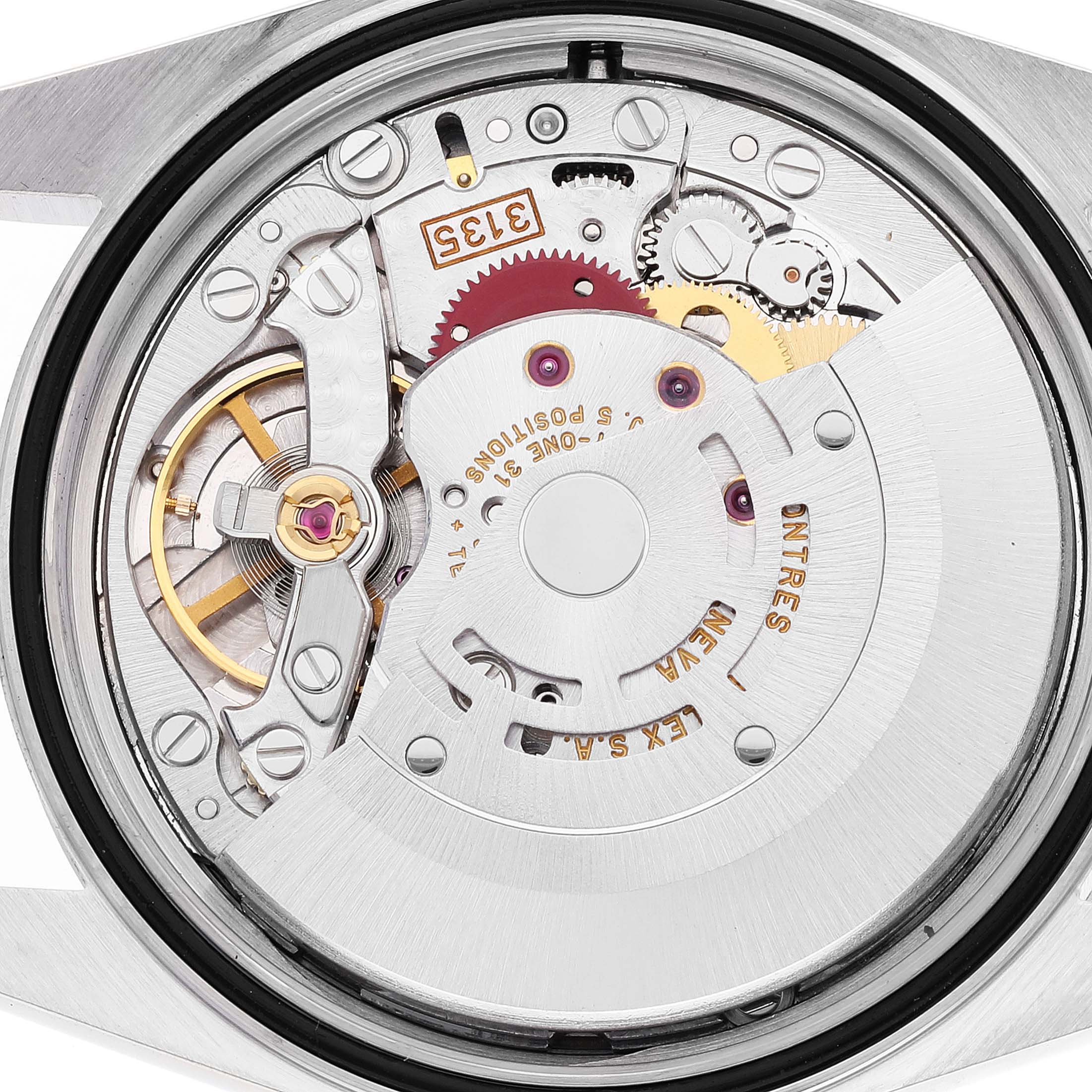 This image shows the movement and internal mechanism of a Rolex Datejust 16233 Men's Steel and Gold (two tone) White Dial 16233 Men's Steel and Gold (two tone) White Dial watch from a back angle.