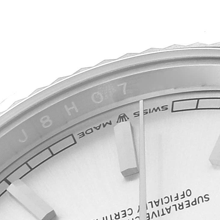 The image shows a close-up of the dial and edge of the bezel of the Rolex President 128239 Men's White Gold Silver Dial 128239 Men's White Gold Silver Dial model watch.