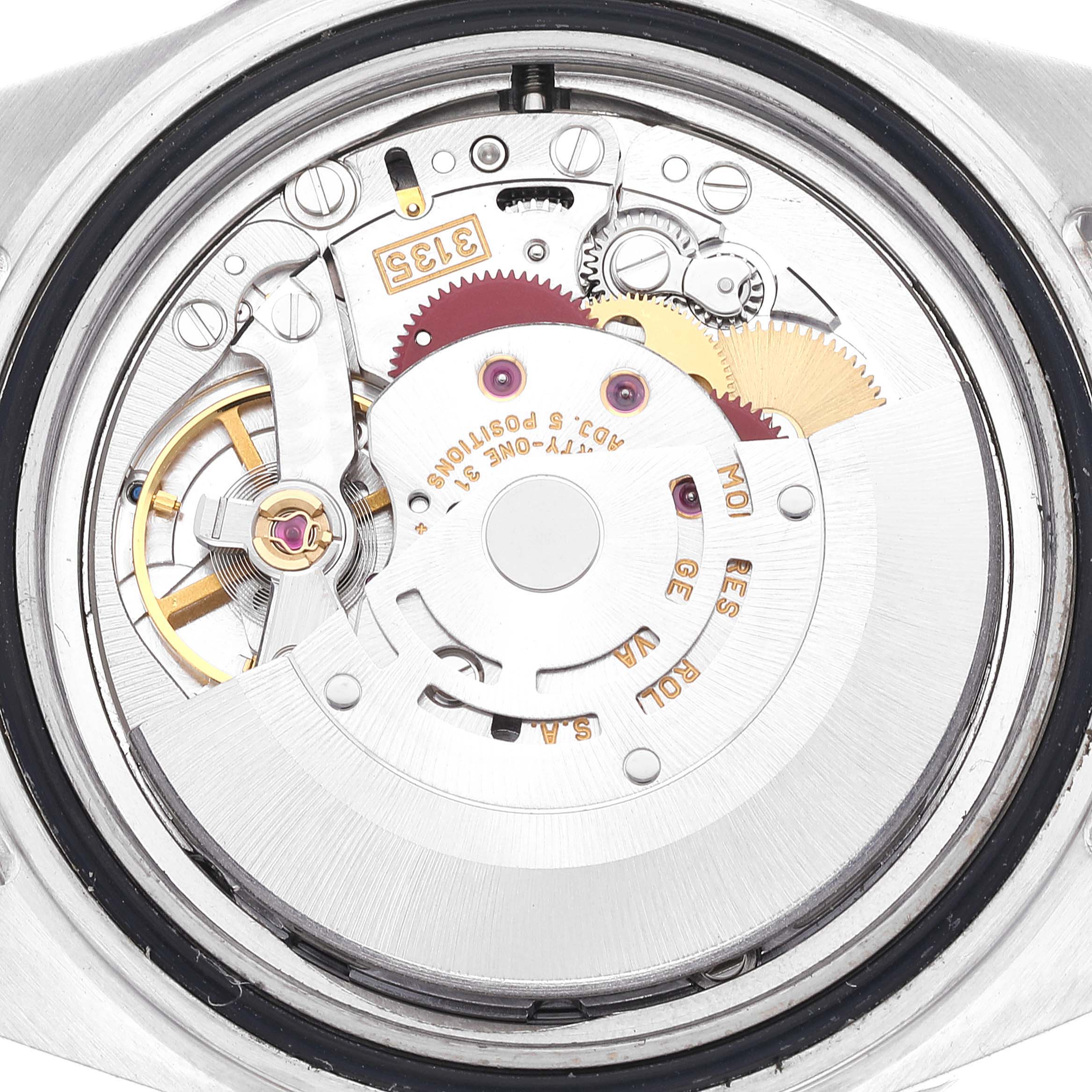 This image shows a close-up view of the internal movement mechanism of a Rolex GMT-Master 16710 Men
s Stainless Steel Black Dial 16710 Men
s Stainless Steel Black Dial watch.