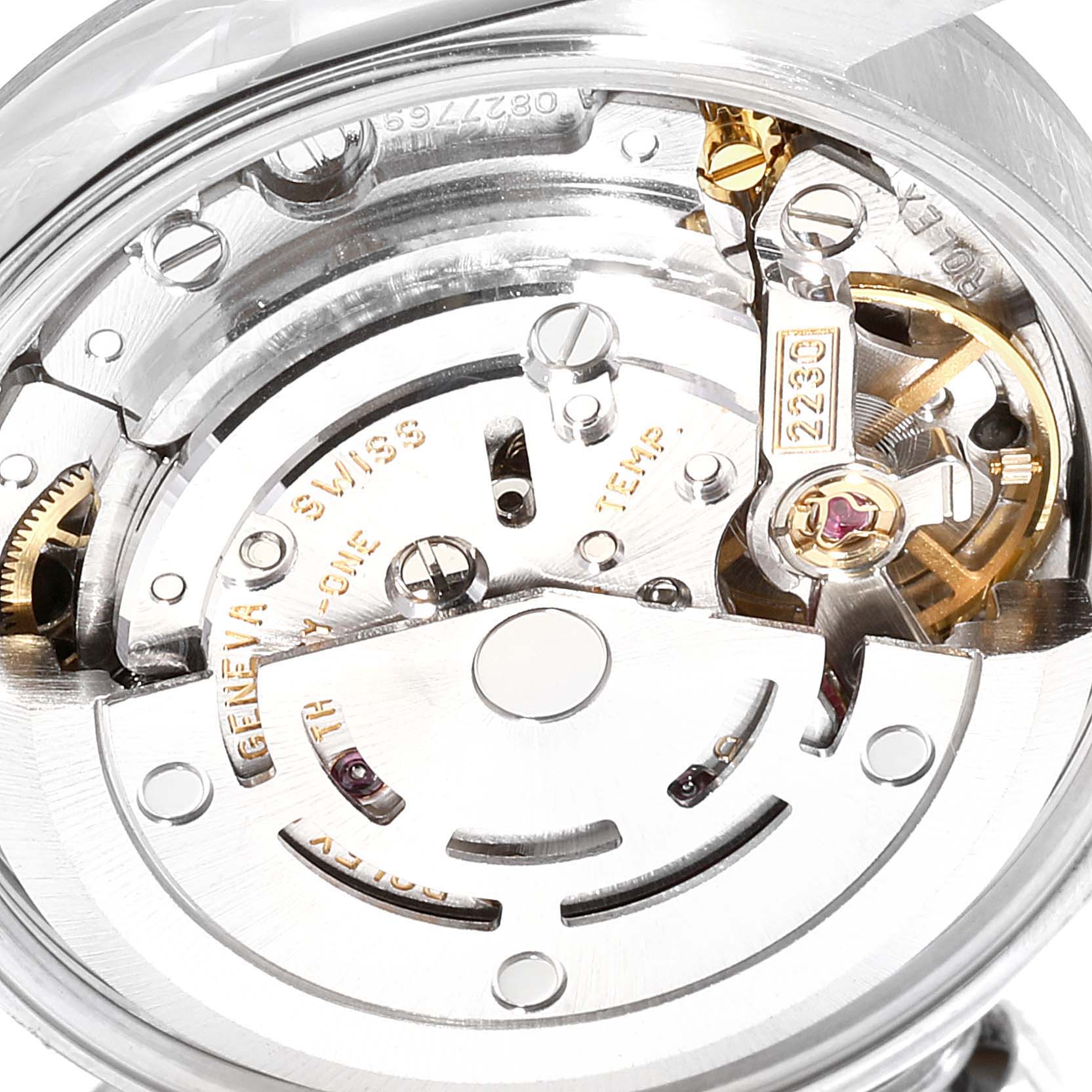 This image shows a close-up of the movement mechanism inside the Rolex Oyster Perpetual 76080 Women's Stainless Steel Black Dial 76080 Women's Stainless Steel Black Dial model.
