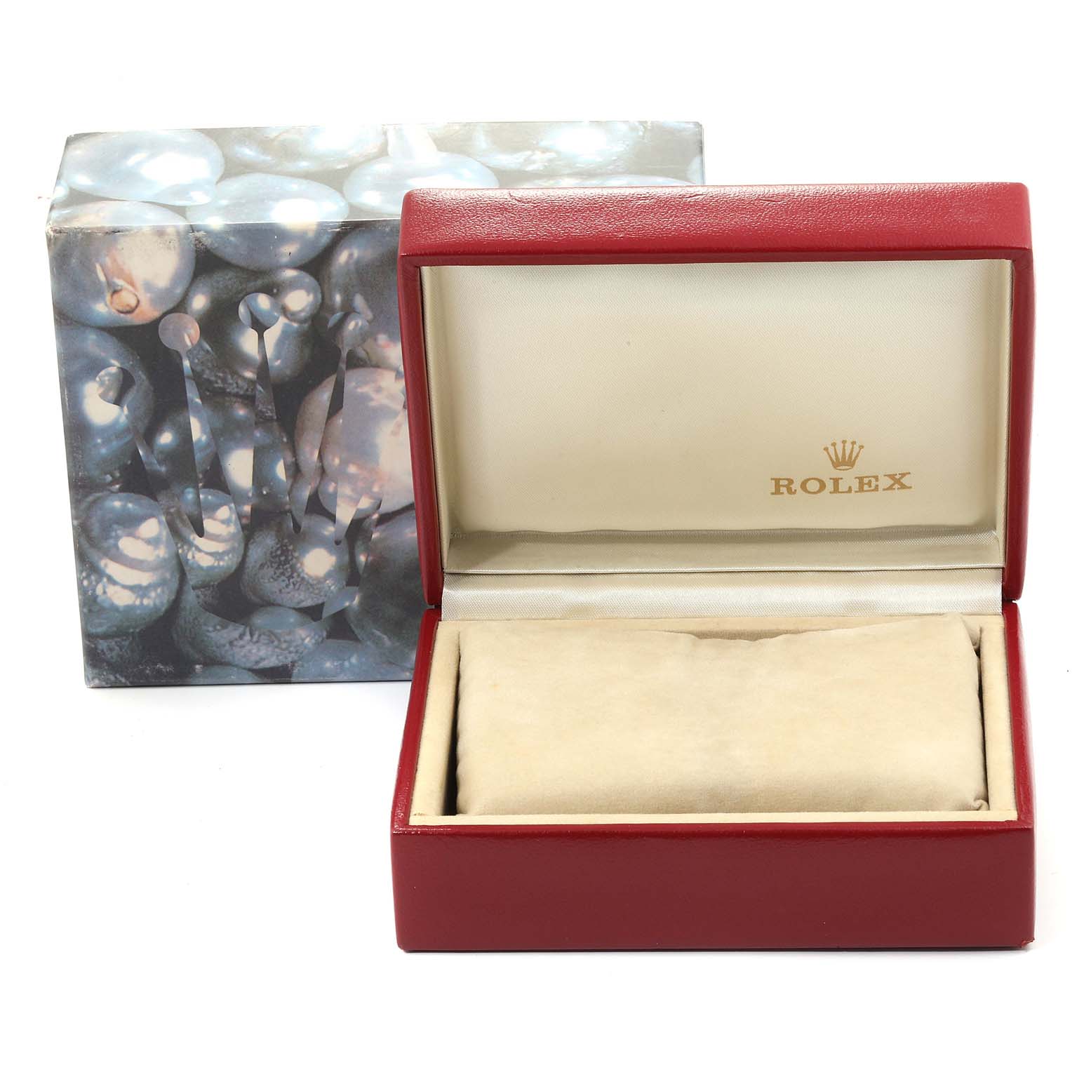 The image shows a Rolex Oyster Perpetual 76080 Women's Stainless Steel Black Dial 76080 Women's Stainless Steel Black Dial watch box, open, with a cushion, and its outer packaging behind.