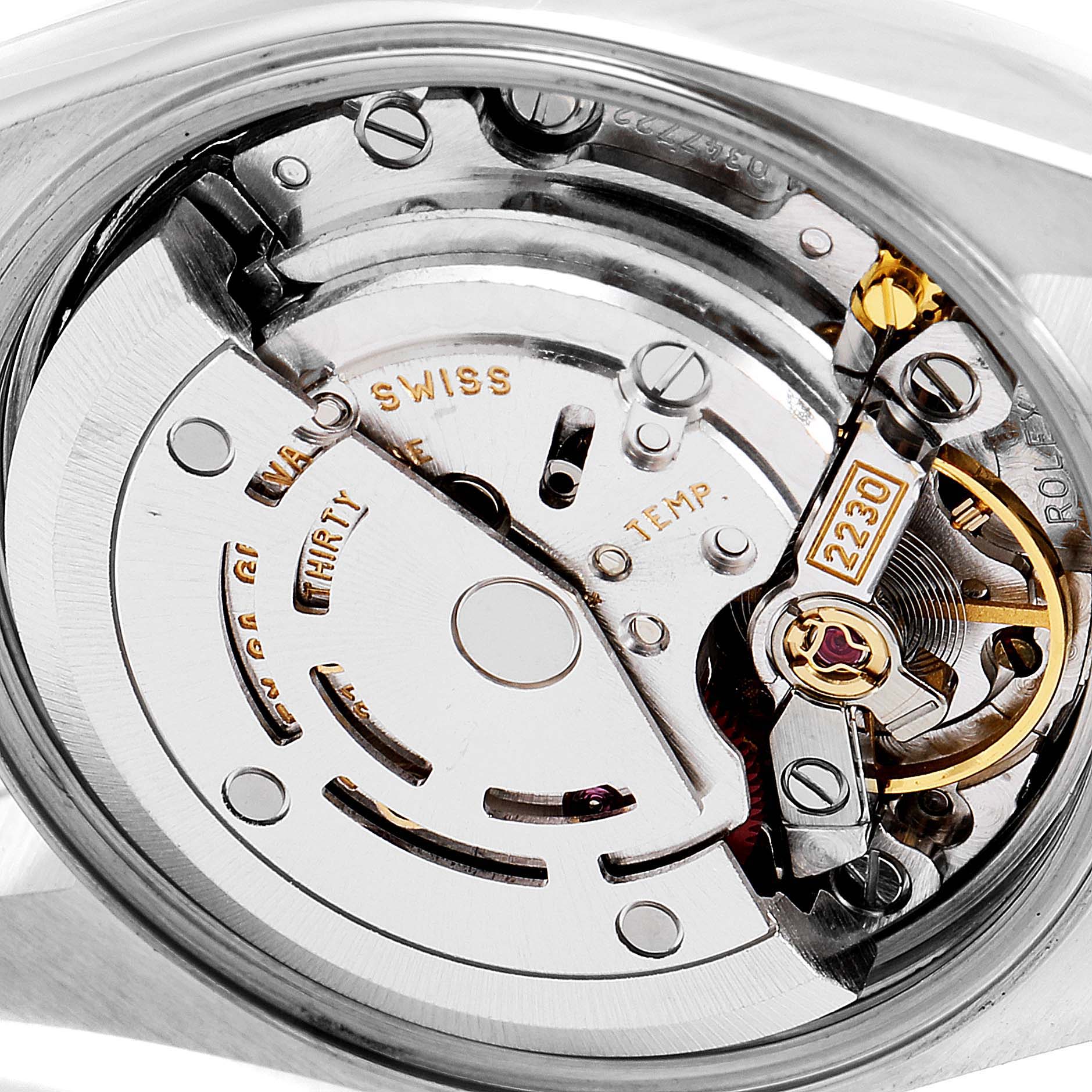 The image shows the internal movement mechanism of a Rolex Oyster Perpetual 76193 Women
s Steel and Gold (two tone) Champagne Dial 76193 Women
s Steel and Gold (two tone) Champagne Dial watch, viewed from the back.