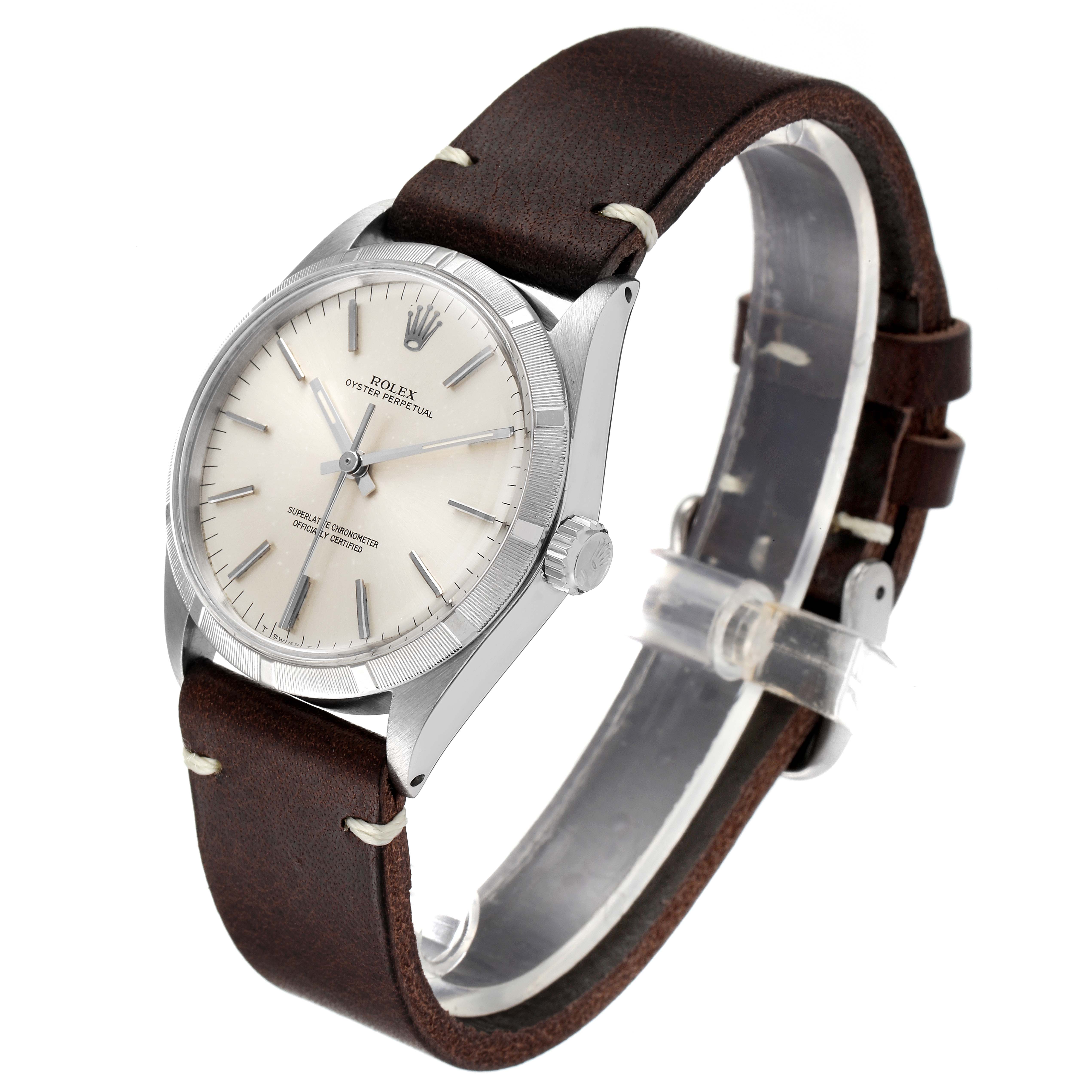 The Rolex Vintage Collection 1003 Men
s Stainless Steel Silver Dial 1003 Men
s Stainless Steel Silver Dial model is shown at a three-quarter angle, displaying the watch face, bezel, crown, and leather strap.