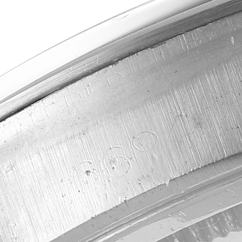 This image shows a close-up of the case back edge and engraving on the Rolex Vintage Collection 6694 Men
s Stainless Steel Silver Dial 6694 Men
s Stainless Steel Silver Dial model watch.