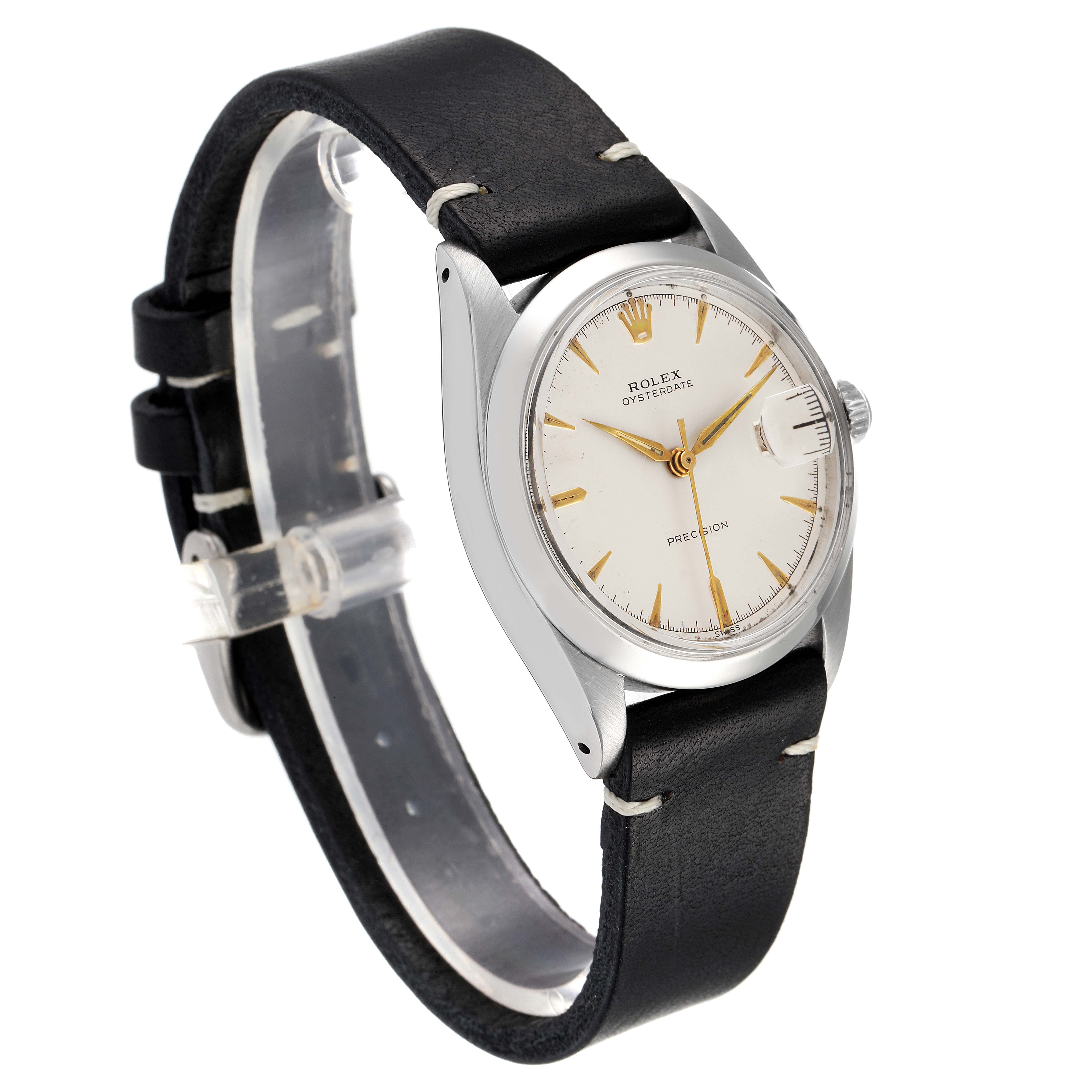 The image shows a side view angle of a Rolex Vintage Collection 6694 Men
s Stainless Steel Silver Dial 6694 Men
s Stainless Steel Silver Dial watch, featuring its black strap, silver casing, and white dial.