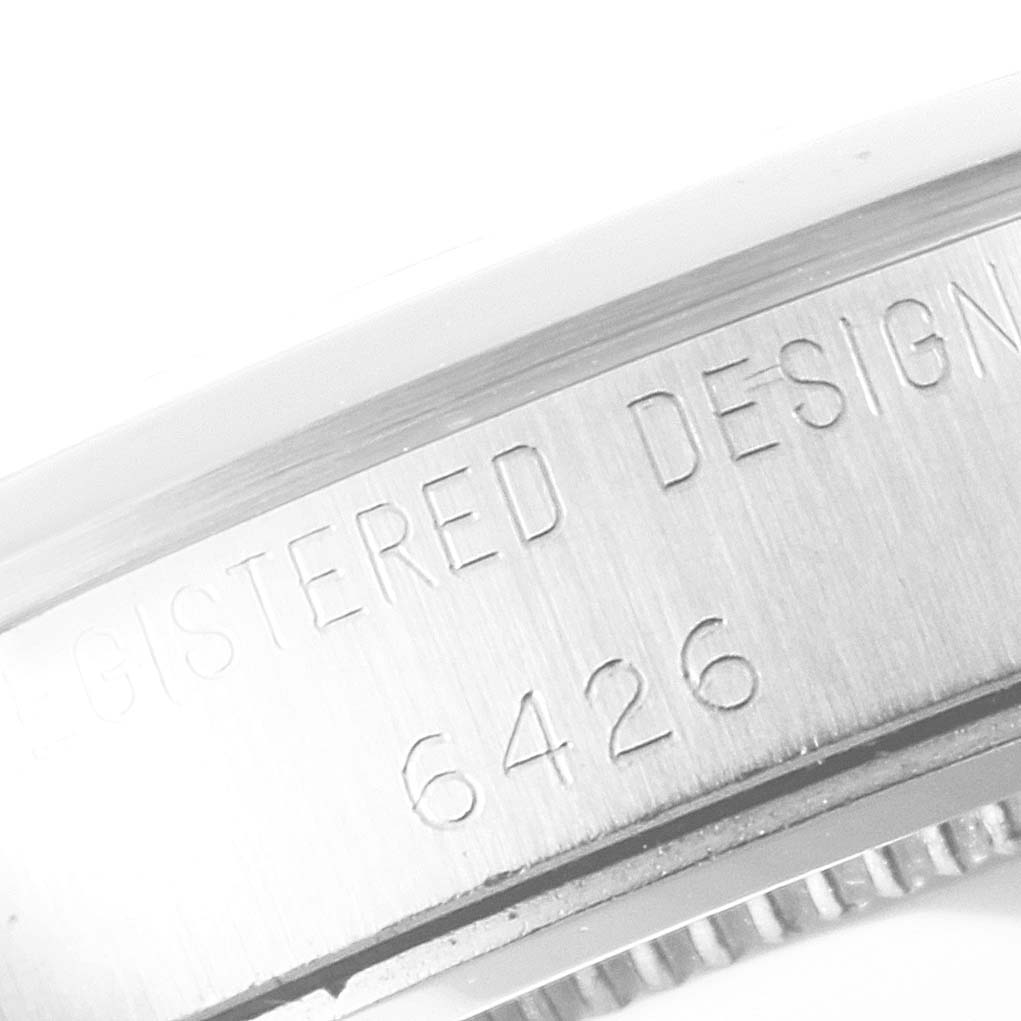The image shows a close-up of the engraved case side of a Vintage Collection Rolex, displaying the model number 6426.