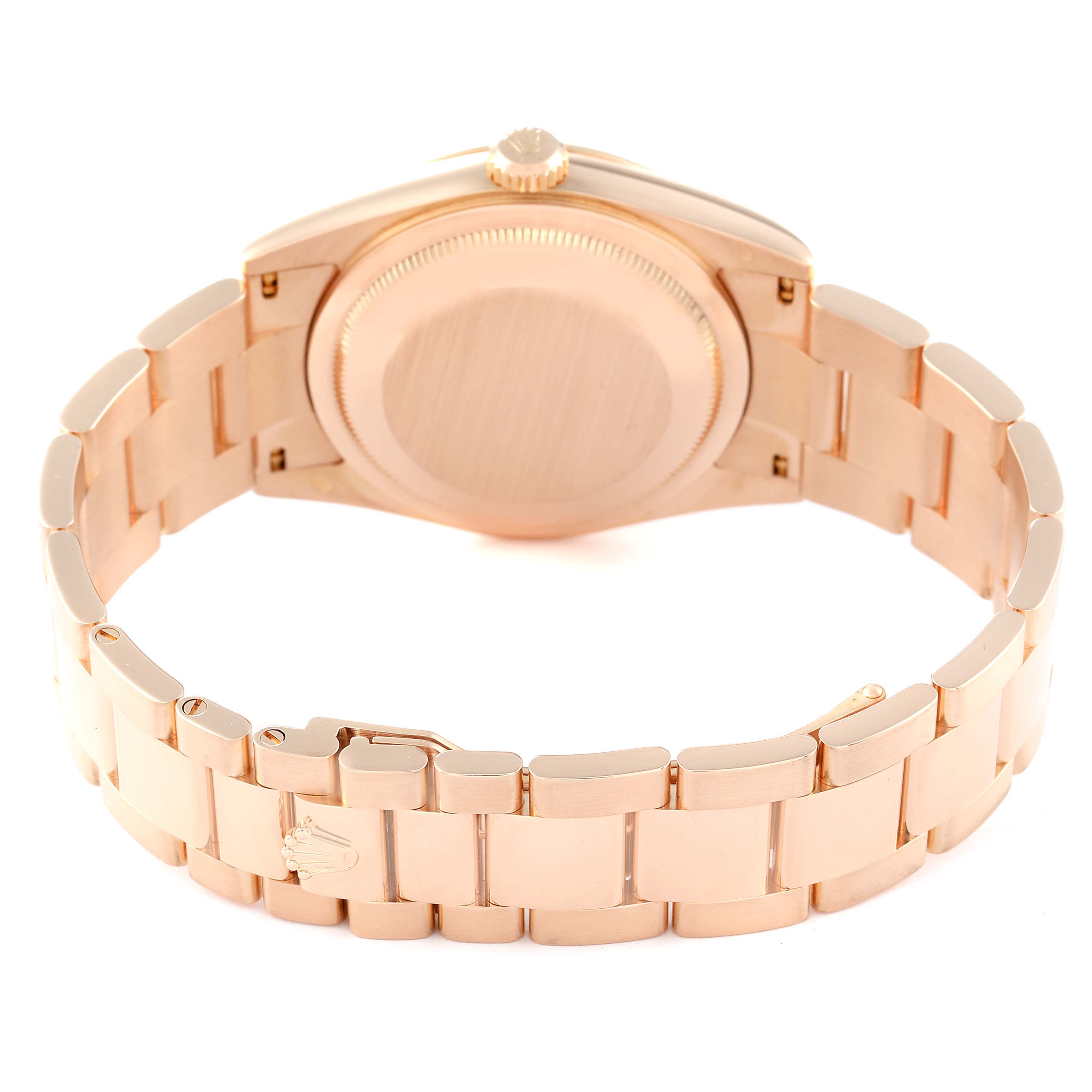 The image shows the back view of the Rolex President 118235 Men's Rose Gold Pink Dial 118235 Men's Rose Gold Pink Dial model watch, highlighting the case back and bracelet.