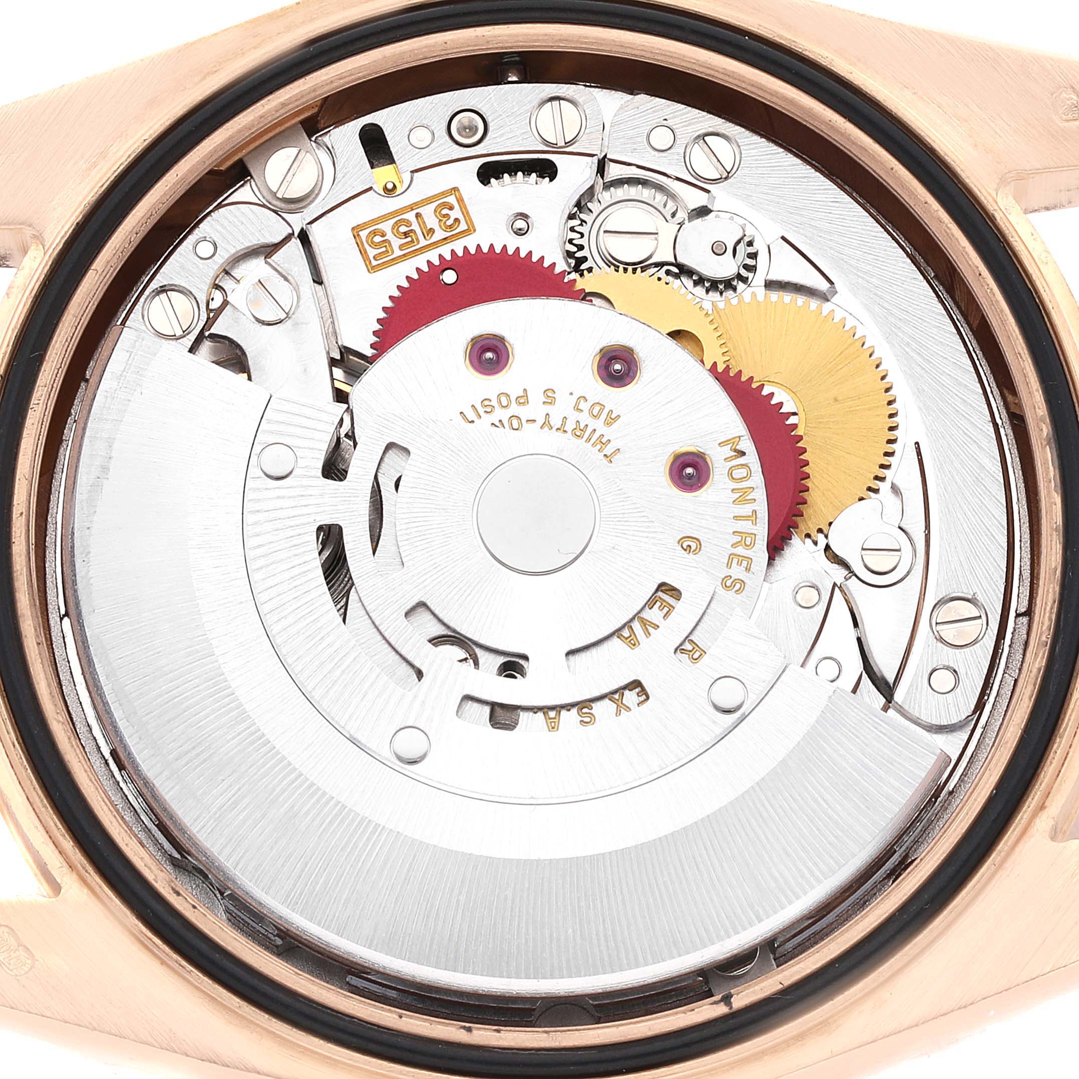 This image shows the movement mechanism of a Rolex President 118235 Men's Rose Gold Pink Dial 118235 Men's Rose Gold Pink Dial model watch viewed from the back case.