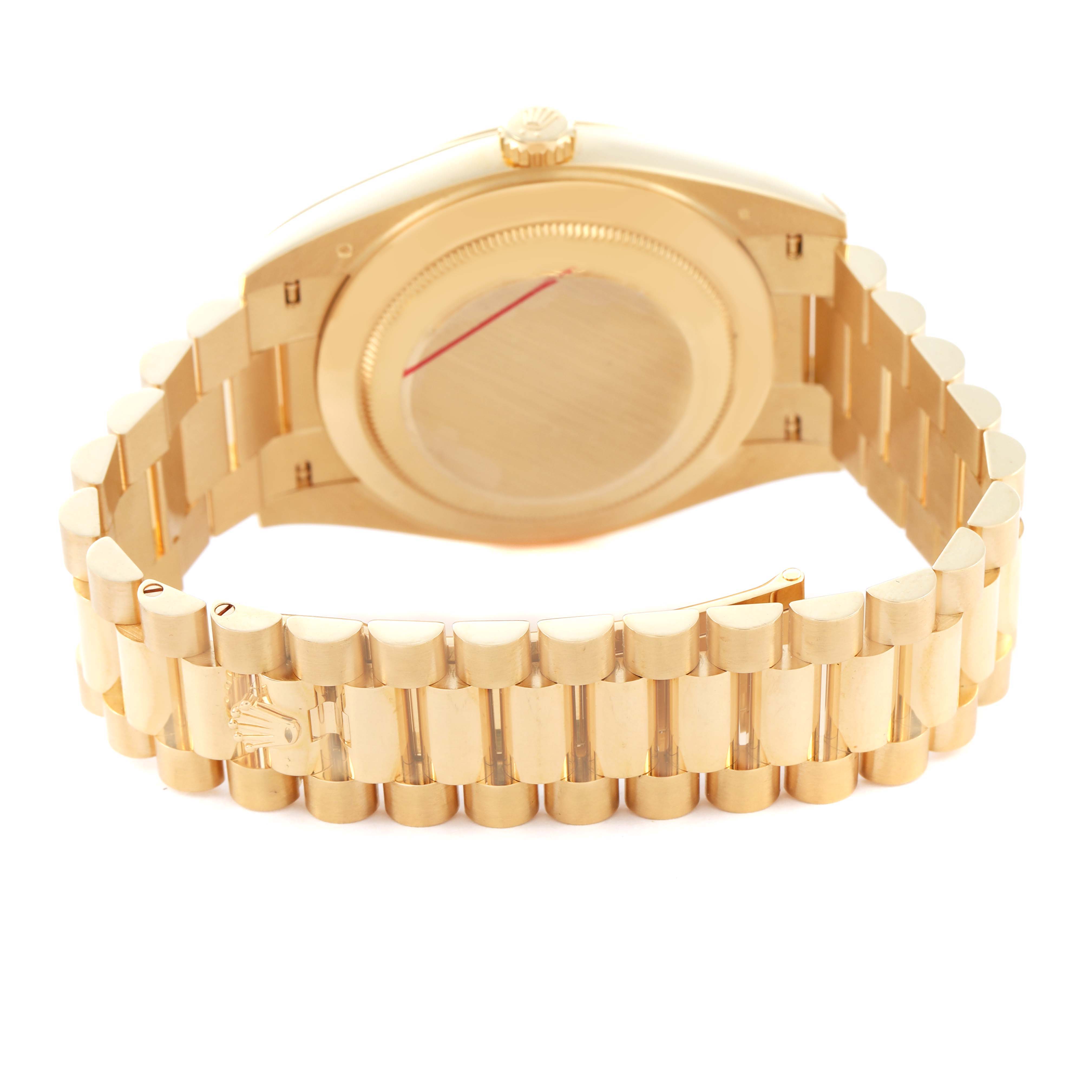 The image shows the back view of a Rolex President 228238 Men's Yellow Gold Black Dial model watch, highlighting the bracelet and closed clasp.