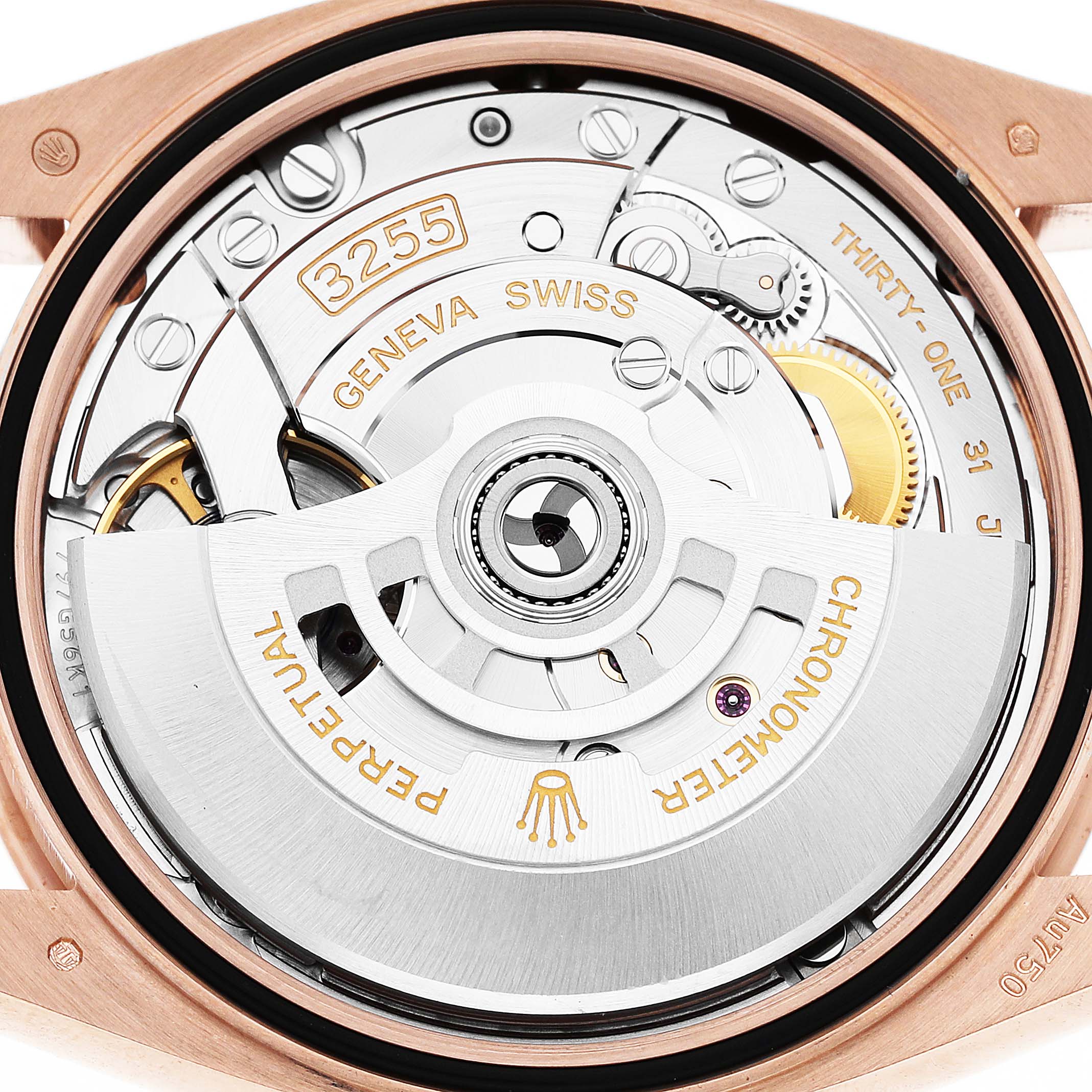 The image shows the back view of a Rolex President 128235 Men's Rose Gold Mother of Pearl Dial model, revealing its intricate movement and rotor mechanism.