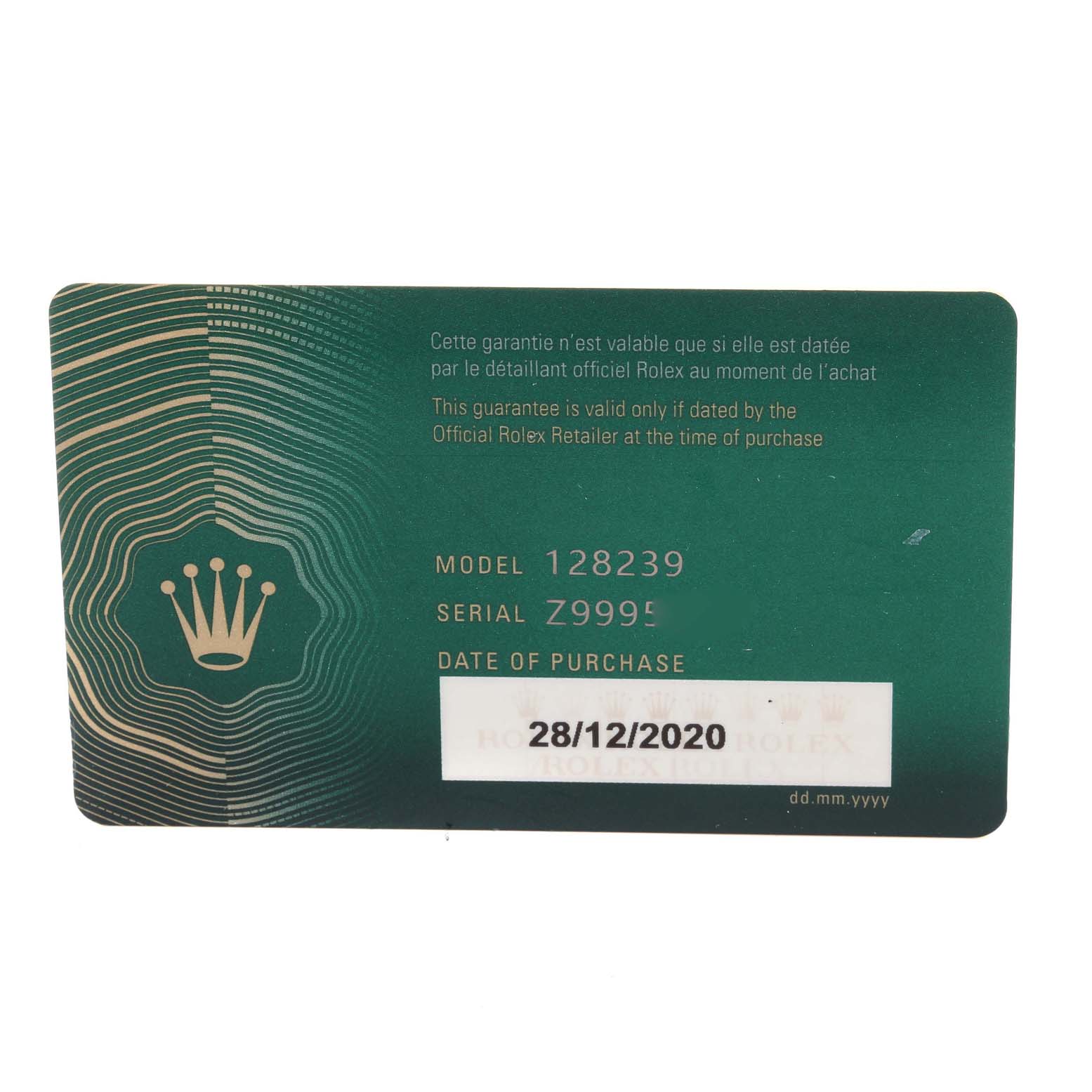 This image shows the guarantee and serial card for the Rolex President 128239 Men's White Gold Blue Dial 128239 Men's White Gold Blue Dial model 128239.