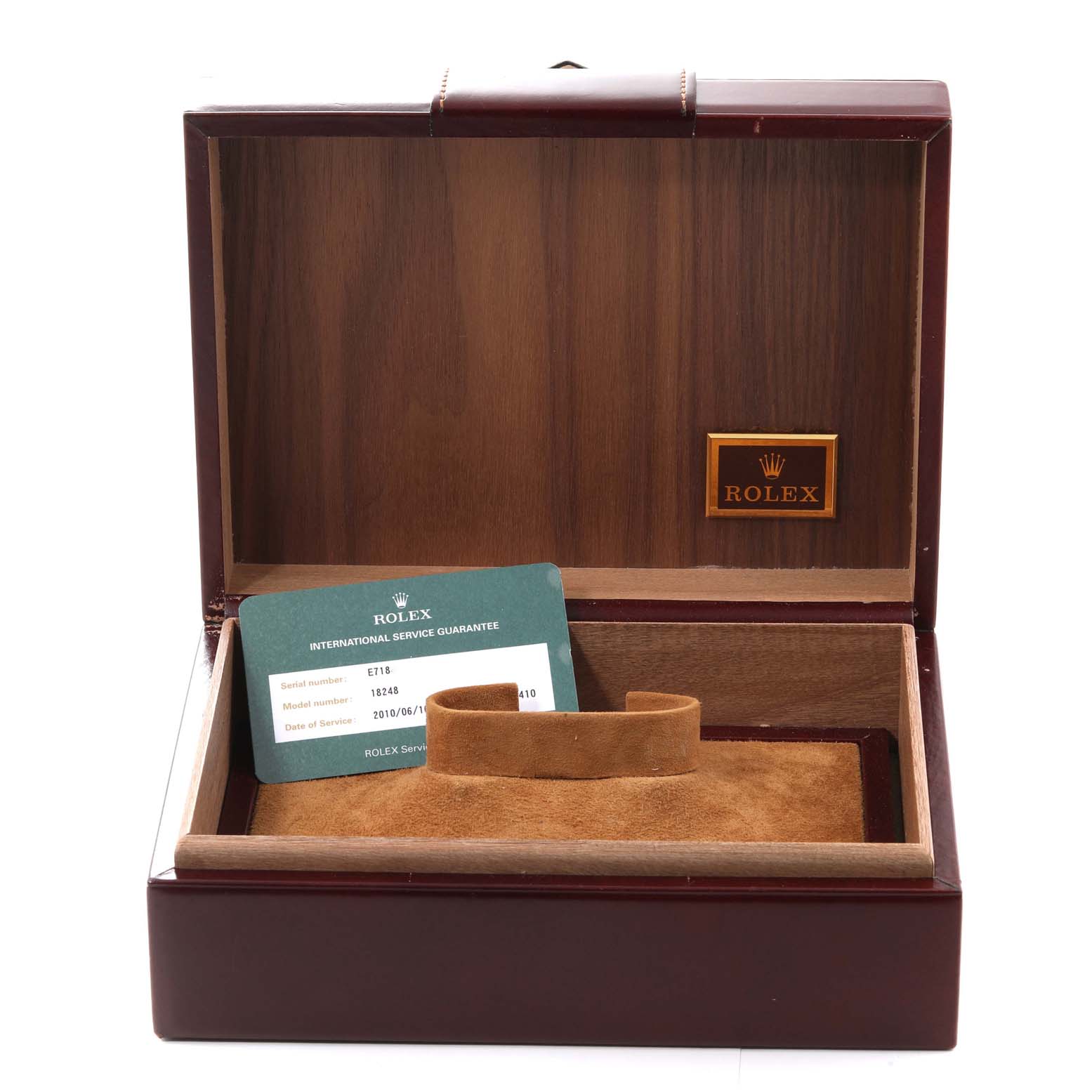 The image shows an open Rolex President 18248 Men
s Yellow Gold Champagne Dial 18248 Men
s Yellow Gold Champagne Dial model watch box with a guarantee card and a watch cushion inside.