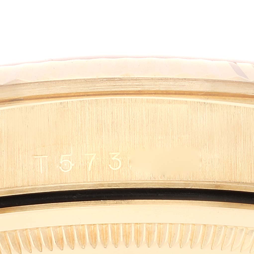 The image shows a close-up side view of the case and bezel of a Rolex President 18238 Men
s Yellow Gold Champagne Dial 18238 Men
s Yellow Gold Champagne Dial watch.