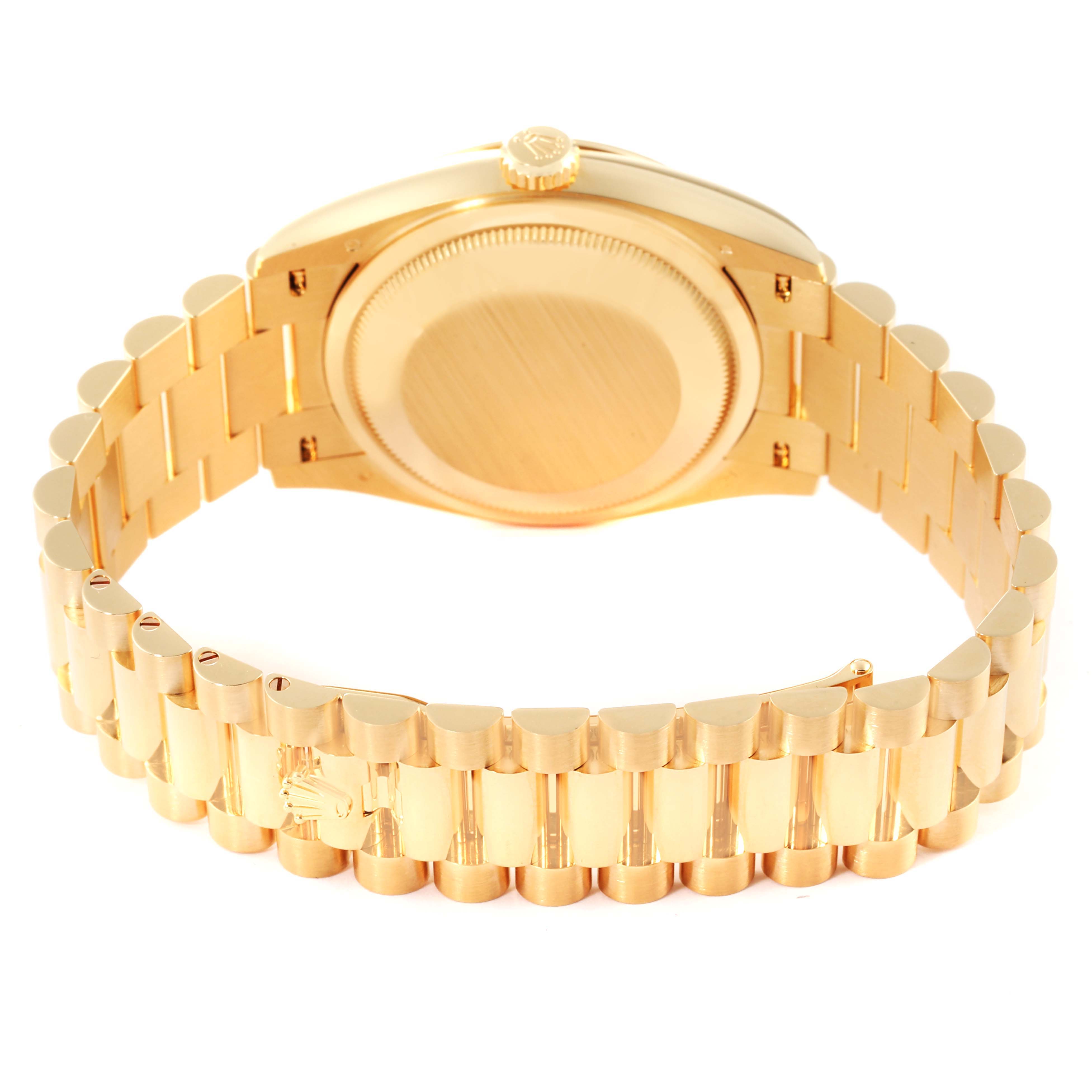 This image shows the backside and bracelet of a Rolex President 128238 Men's Yellow Gold Champagne Dial 128238 Men's Yellow Gold Champagne Dial model watch from a rear angle.