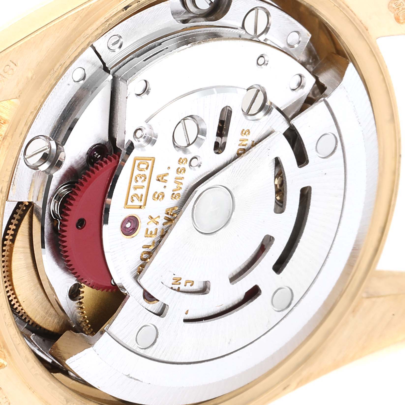 The image shows the internal mechanism of a Rolex President 67198 Women
s Yellow Gold Champagne Dial 67198 Women
s Yellow Gold Champagne Dial model watch from a close-up angle.