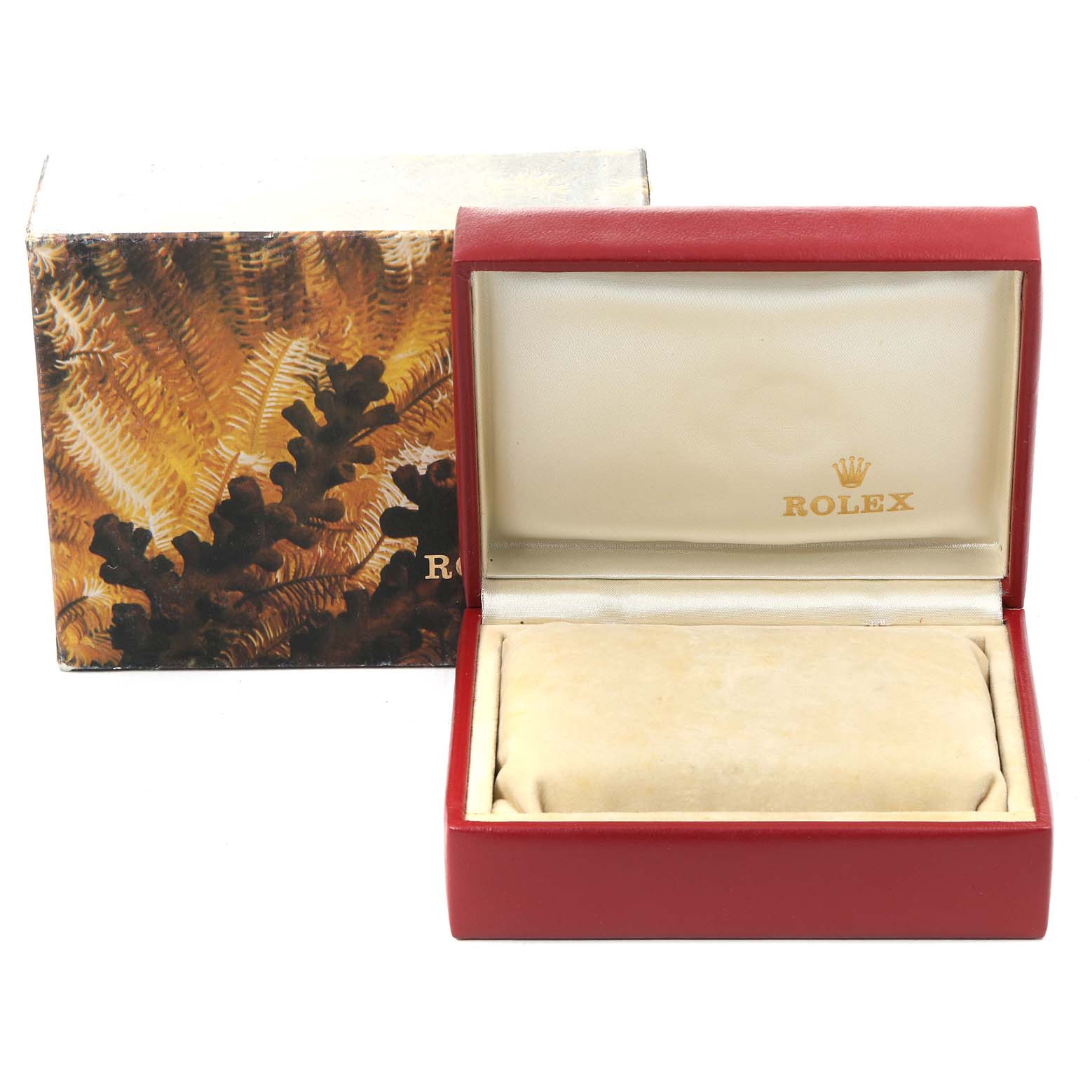 The image shows an open Rolex watch box with a cushion, associated with the President model.