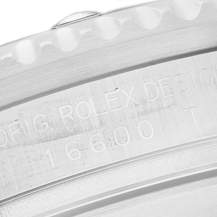 This close-up image of the Rolex Sea-Dweller 16600 Men
s Stainless Steel Black Dial 16600 Men
s Stainless Steel Black Dial watch showcases the engraved model number on its case back.