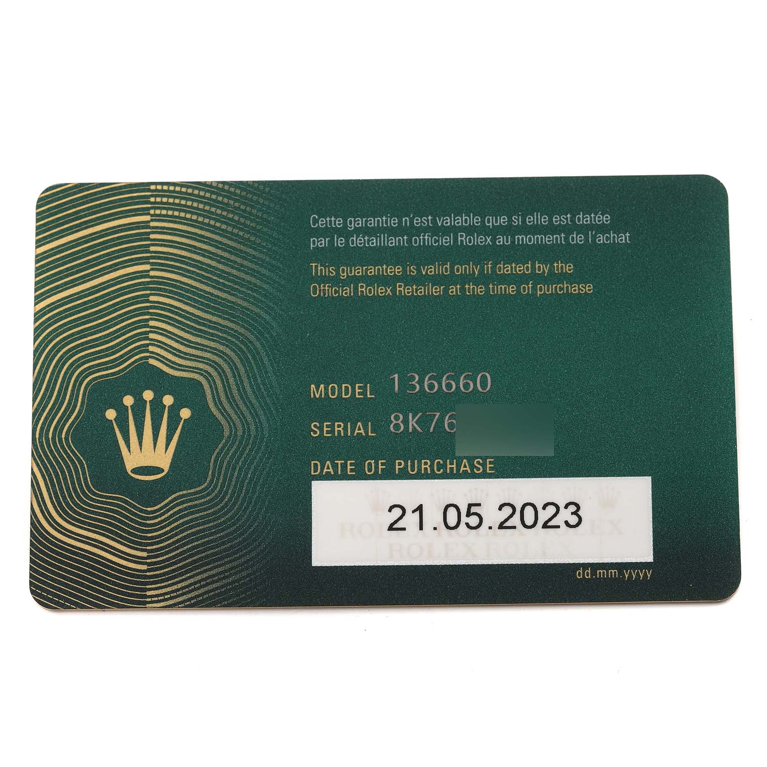 This is a warranty card for the Rolex Sea-Dweller 136660 Men
s Stainless Steel Blue Dial 136660 Men
s Stainless Steel Blue Dial model 136660, showing the model number, serial number, and purchase date.