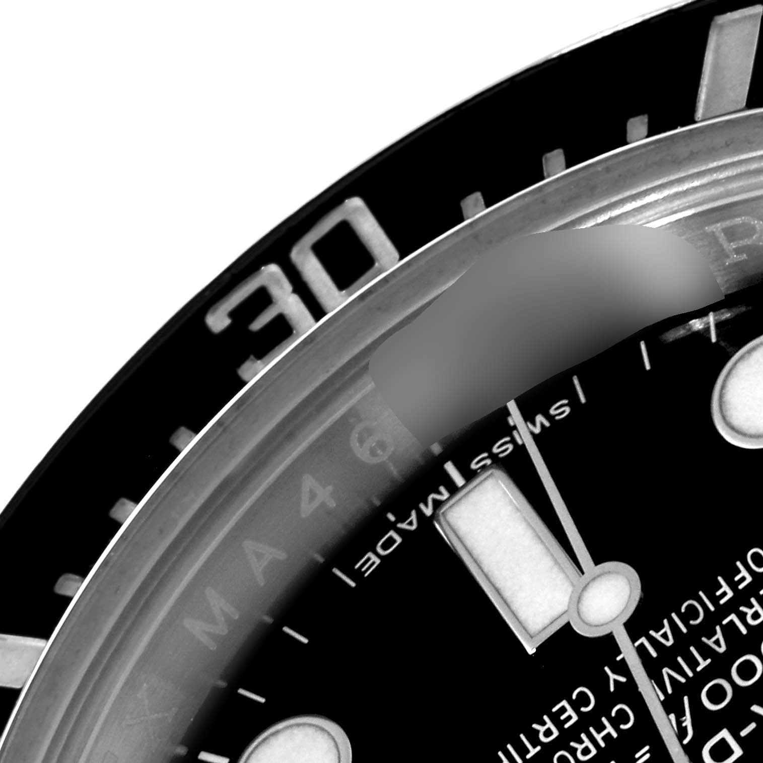 The image shows a close-up of the dial and bezel of a Rolex Sea-Dweller 116600 Men's Stainless Steel Black Dial 116600 Men's Stainless Steel Black Dial watch, focusing on the 30-minute mark and part of the hour markers.