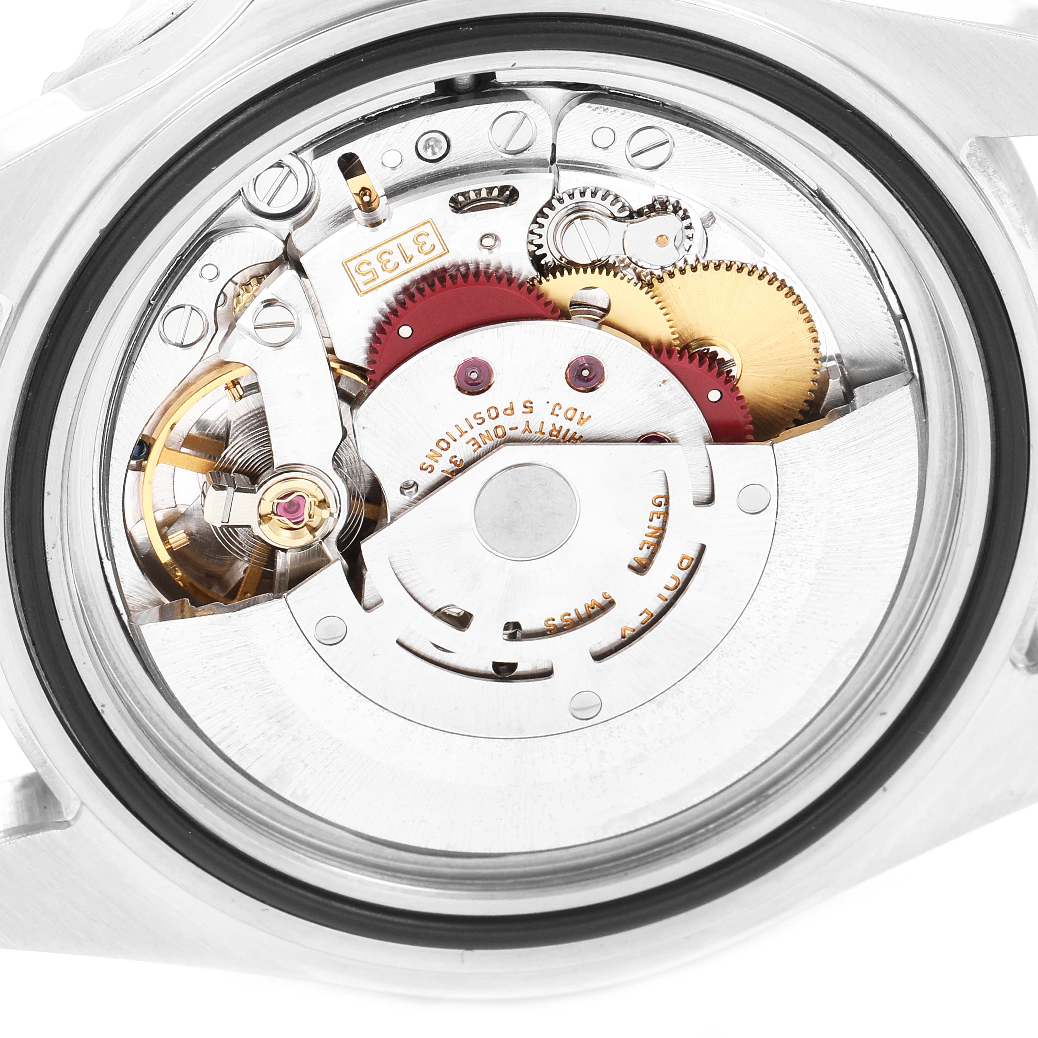 This image shows the inner mechanical movement of a Rolex Submariner 16610LV Men
s Stainless Steel Black Dial 16610LV Men
s Stainless Steel Black Dial watch from a rear angle.