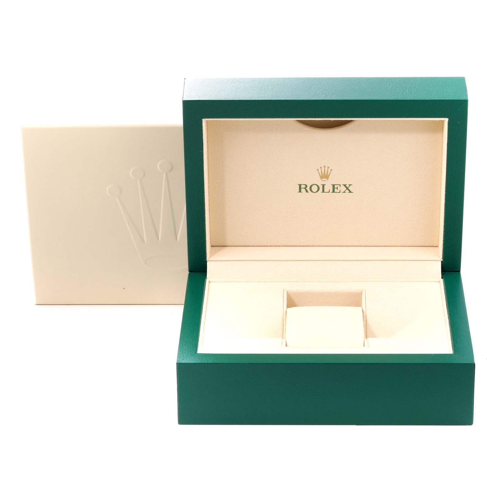This image shows an open Rolex watch box for the Submariner model, displaying the interior and exterior, including the green outer box.