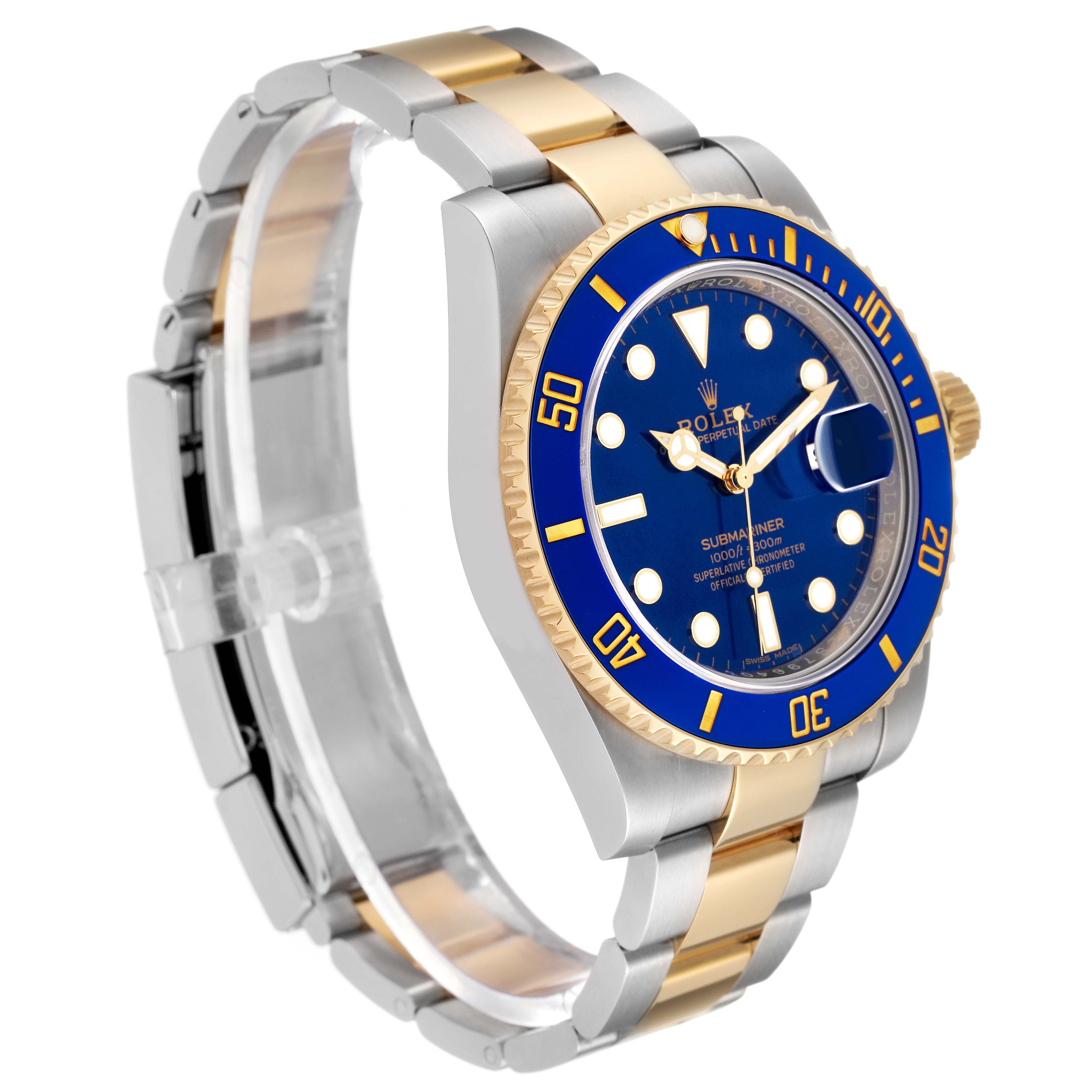 The image shows an angled view of a Rolex Submariner 116613 Men's Steel and Gold (two tone) Blue Dial 116613 Men's Steel and Gold (two tone) Blue Dial watch, highlighting its gold and steel bracelet, bezel, and blue dial.
